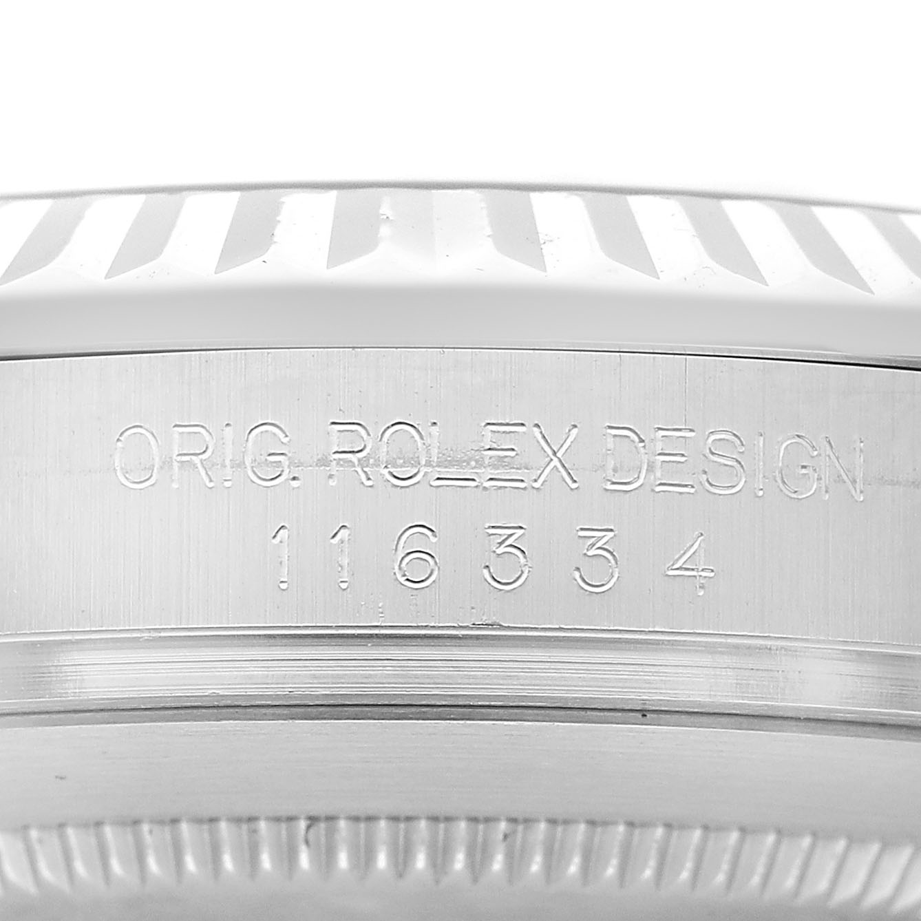 The image shows a close-up of the side of the Rolex Datejust 41 116334 Men's Stainless Steel White Dial, featuring engraved model details.