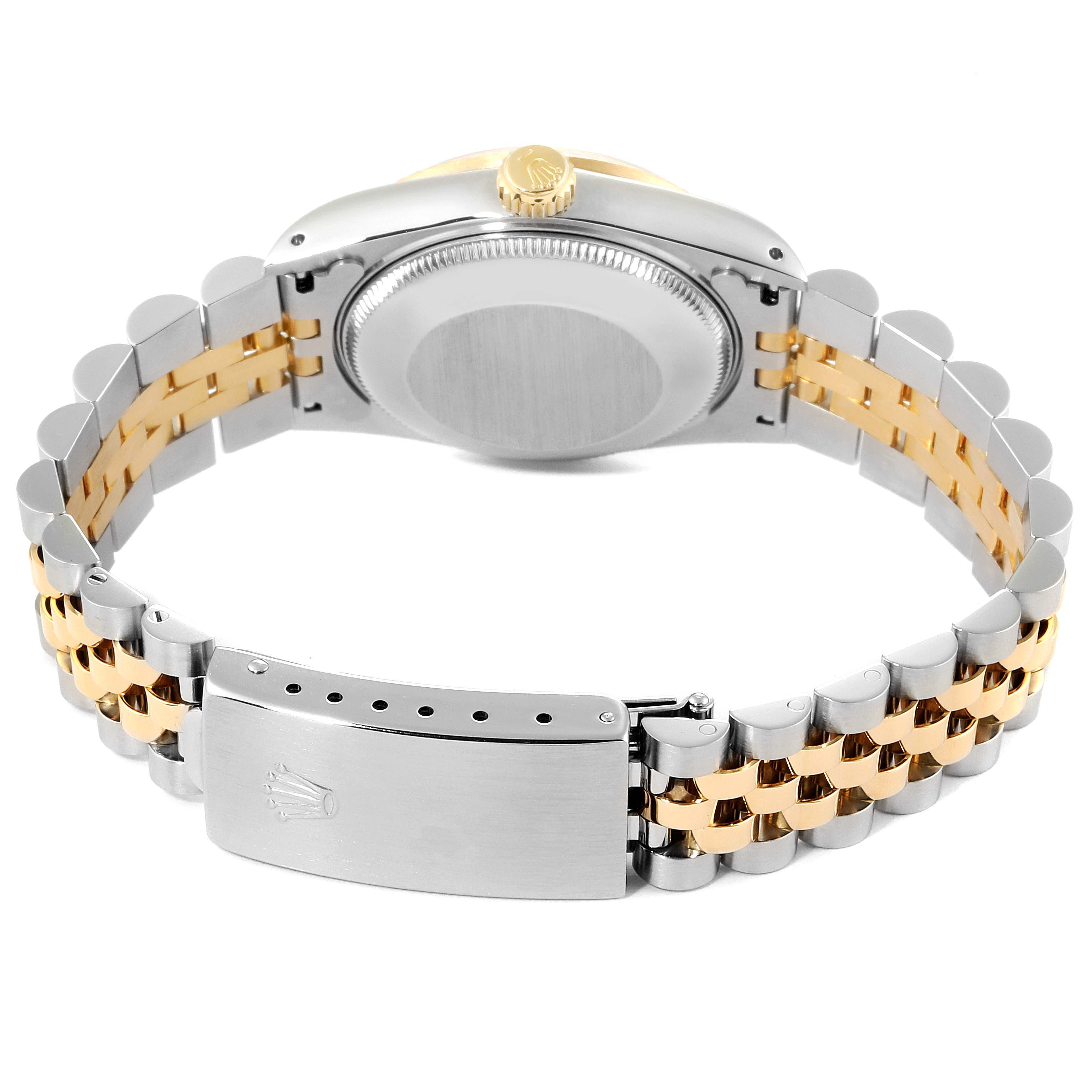 The image shows the back and band of a Rolex Mid-Size 68273 Women's Steel and Gold (two tone) Champagne Dial 68273 Women's Steel and Gold (two tone) Champagne Dial watch, highlighting the case back and two-tone metal bracelet clasp.