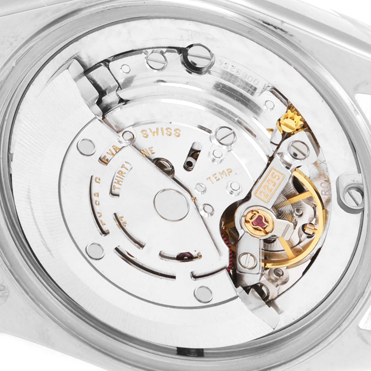 The image shows the movement mechanism of a Mid-Size Rolex watch, viewed from the back.