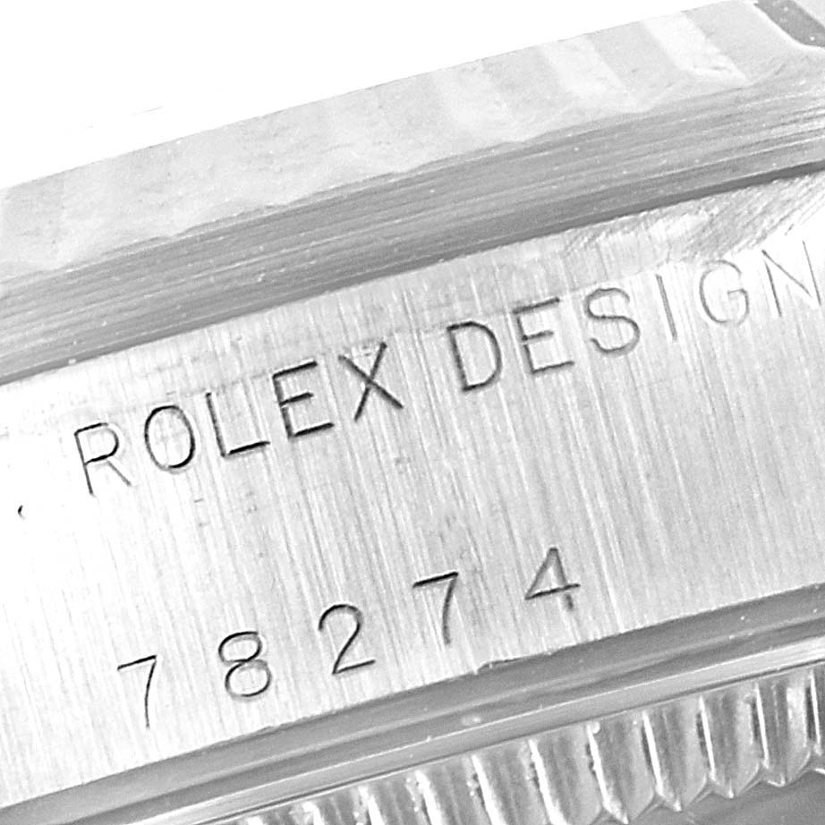 This image shows a close-up of the case side engraving of a mid-size Rolex watch, displaying the text "ROLEX DESIGN" and the model number "78274."