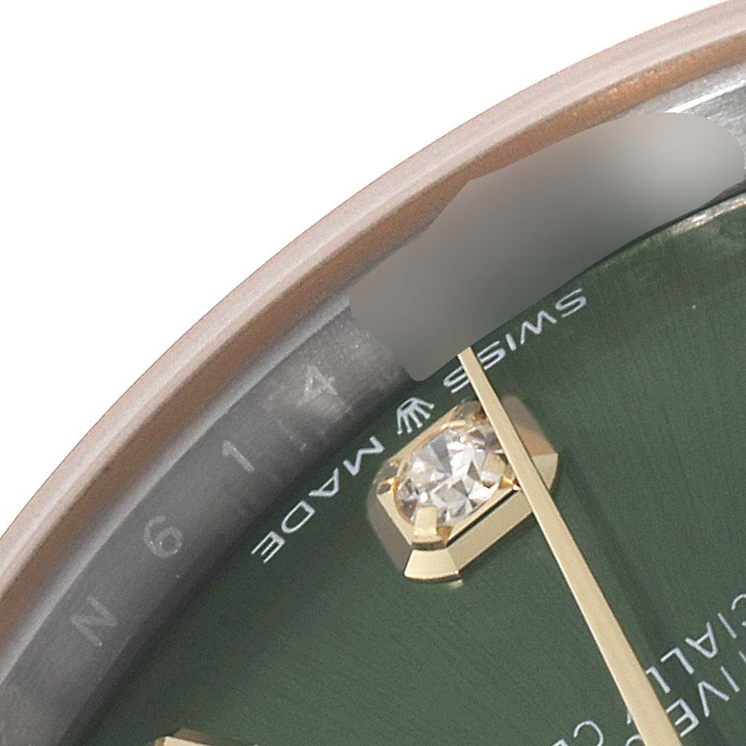 The image shows a close-up of the dial and bezel of a Mid-Size Rolex watch, highlighting the Swiss Made mark and diamond hour marker.