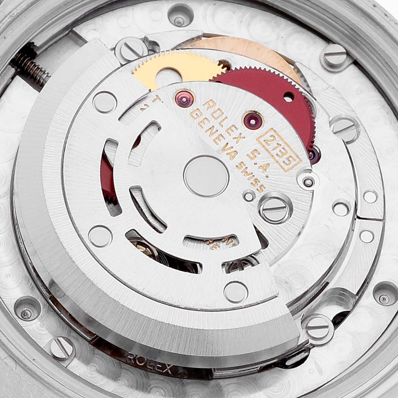 The image shows the inner mechanism of a Mid-Size Rolex watch, focused on the rotor and movement components.