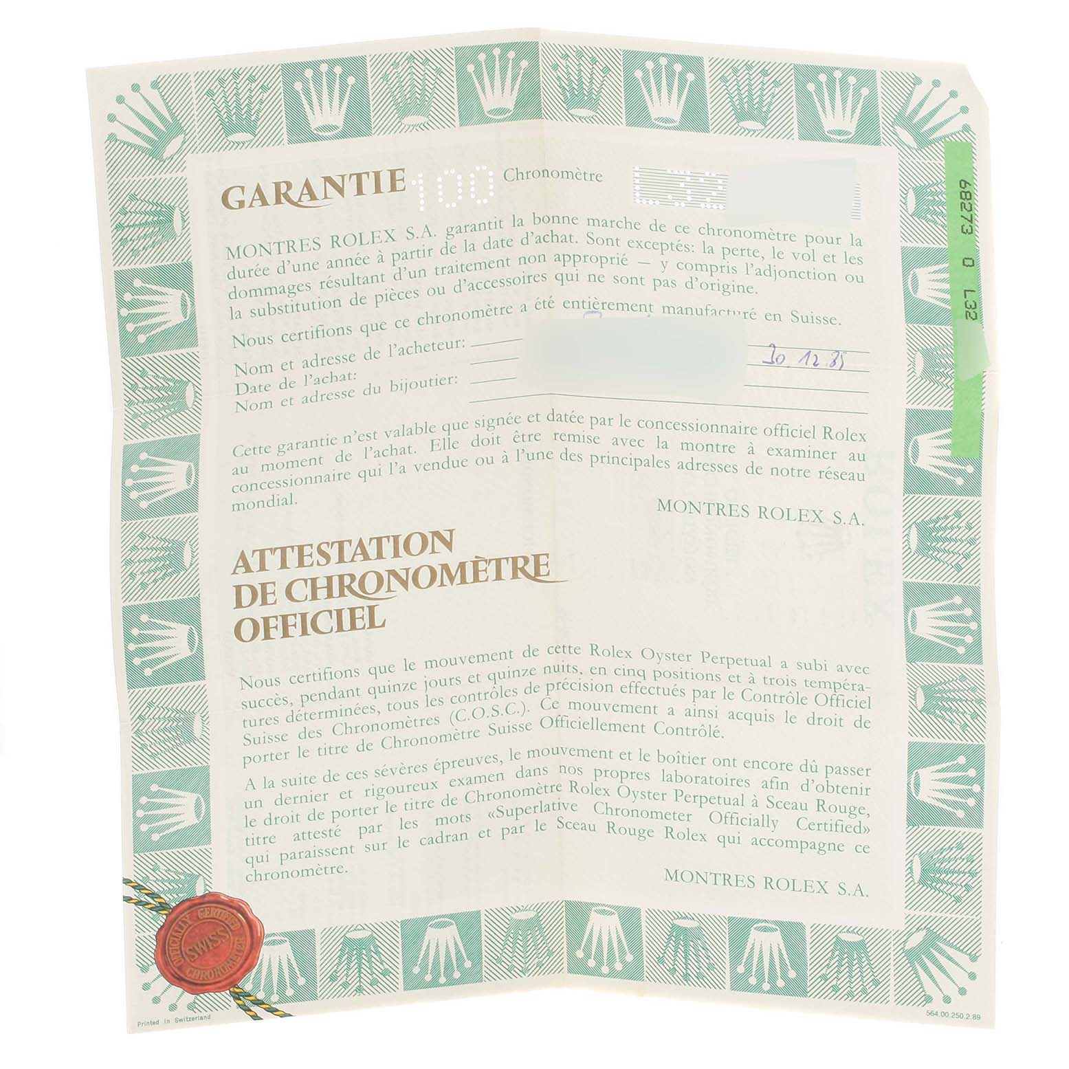 The image shows a Rolex Mid-Size 68273 Women
s Steel and Gold (two tone) Silver Dial 68273 Women
s Steel and Gold (two tone) Silver Dial model warranty card and certificate.