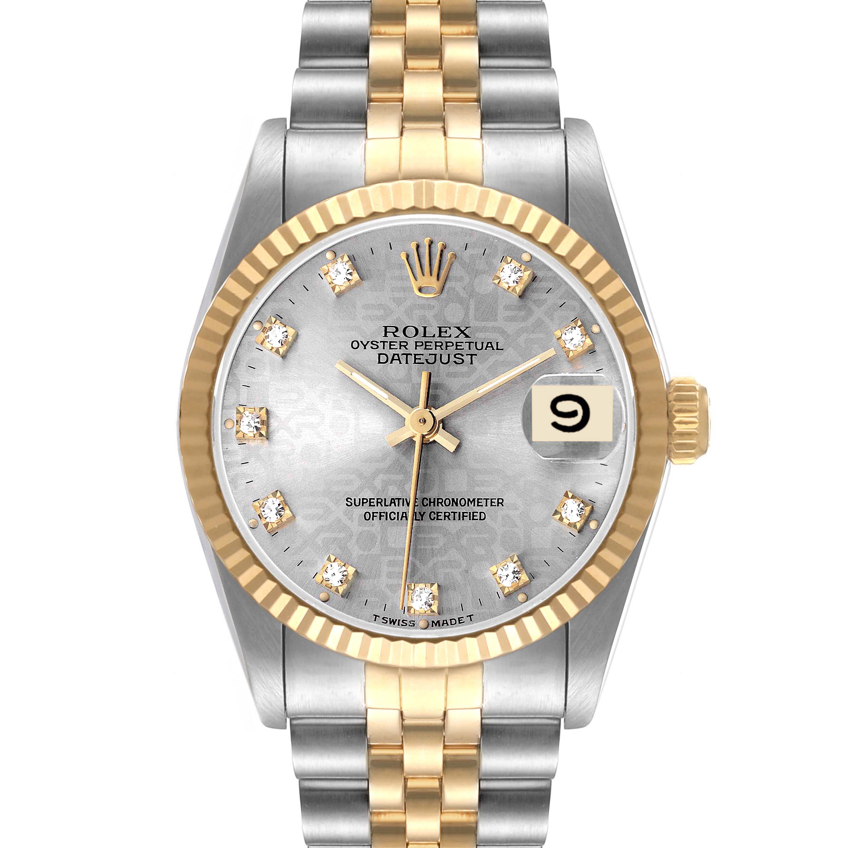 This Rolex Mid-Size 68273 Women
s Steel and Gold (two tone) Silver Dial 68273 Women
s Steel and Gold (two tone) Silver Dial Datejust watch is shown from a front angle, displaying the dial, bezel, and bracelet.