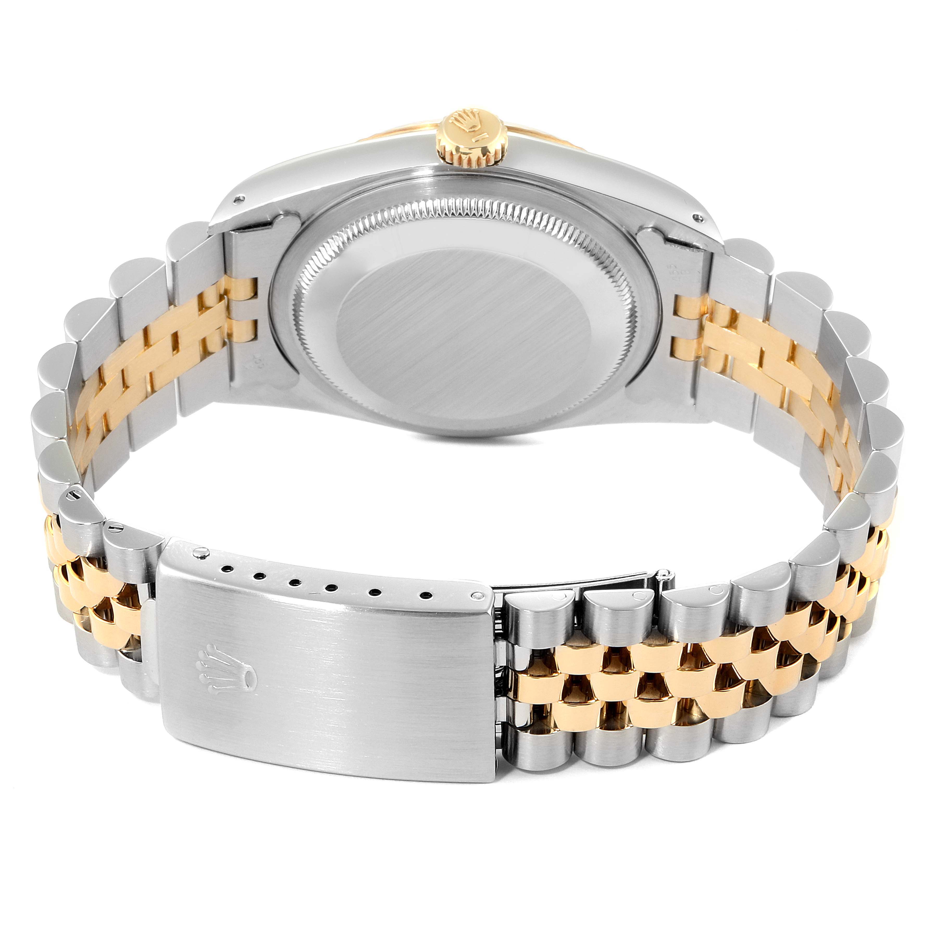 The image shows the back view of a Rolex Datejust 16233 Men's Steel and Gold (two tone) Champagne Dial 16233 Men's Steel and Gold (two tone) Champagne Dial watch, highlighting the case back, crown, and two-tone bracelet.