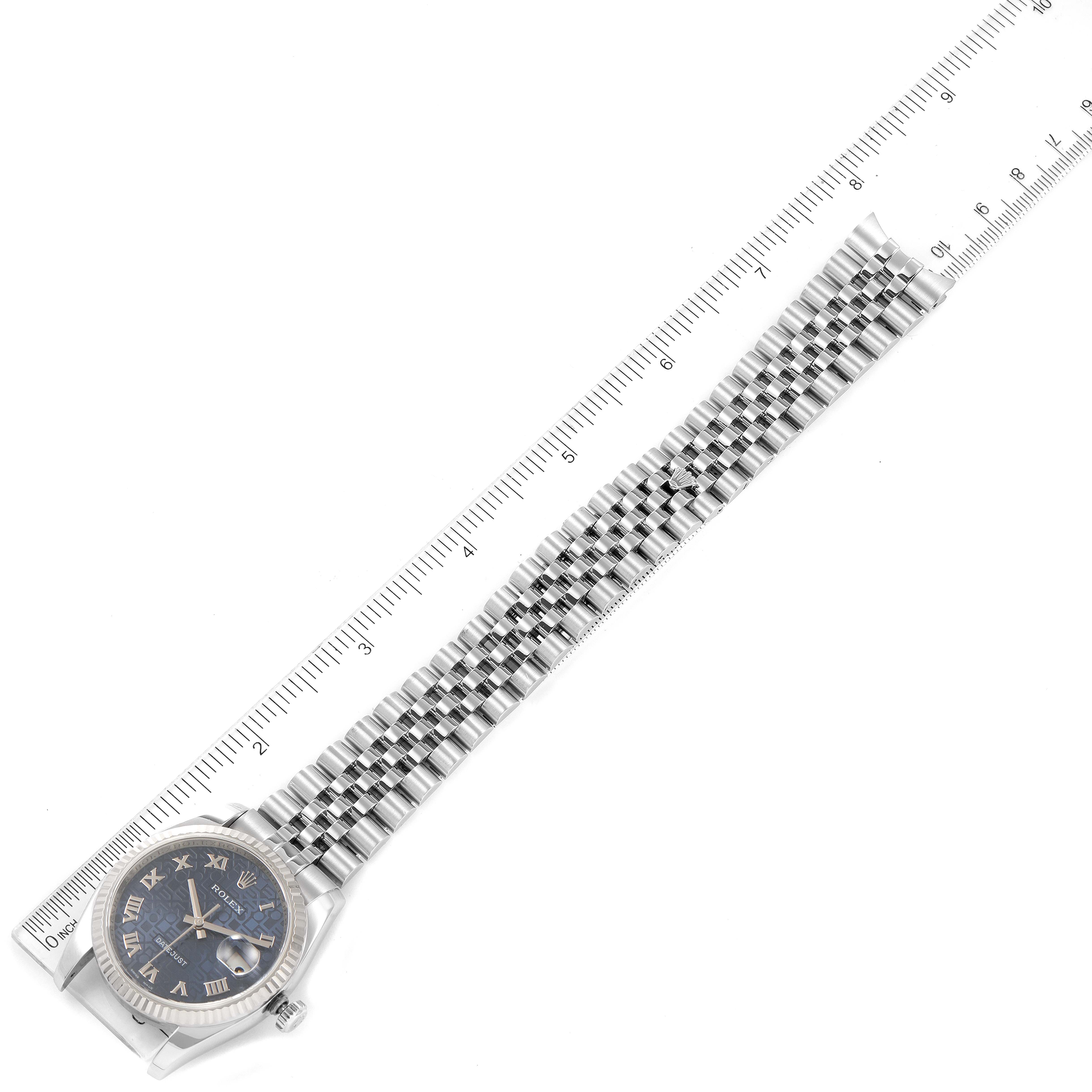 The image shows a Rolex Datejust 116234 Men's Stainless Steel Blue Dial 116234 Men's Stainless Steel Blue Dial watch laid flat, highlighting the face and bracelet against a measuring ruler.