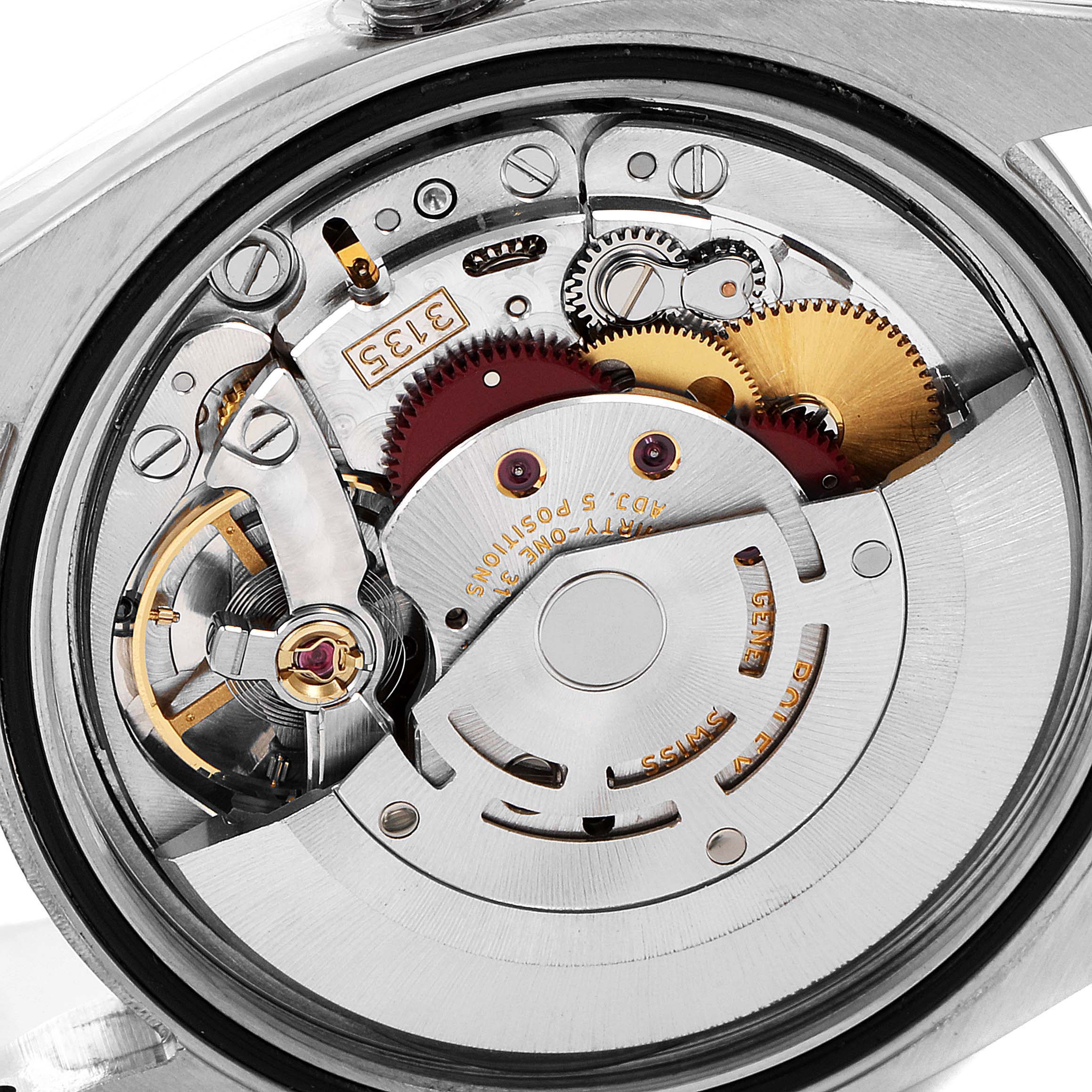 This image shows the intricate movement mechanism of the Rolex Datejust 116234 Men's Stainless Steel Blue Dial 116234 Men's Stainless Steel Blue Dial watch, viewed from the back.