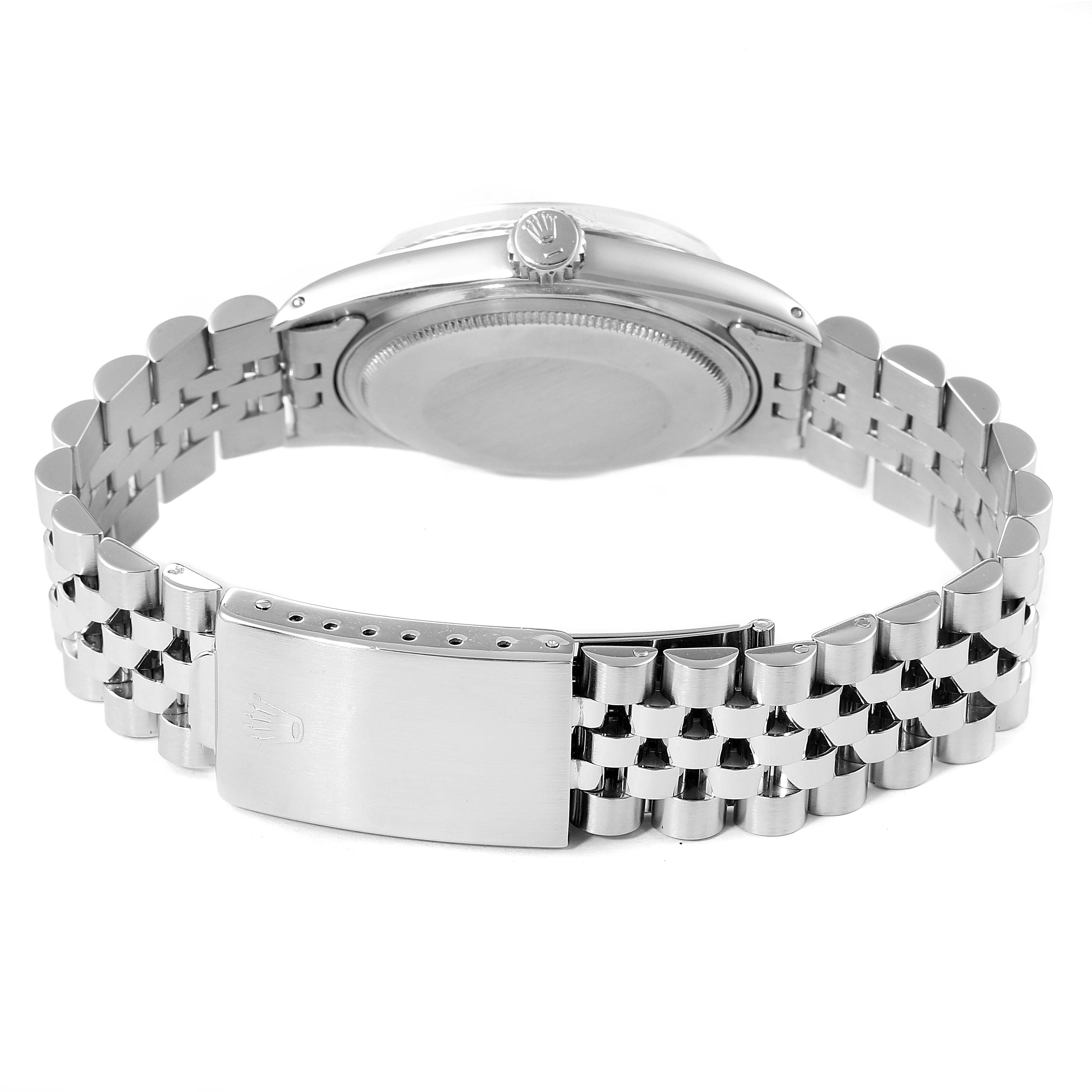 The image shows the back case and clasp of a Rolex Vintage Collection 1601 Men's Stainless Steel Grey Dial 1601 Men's Stainless Steel Grey Dial watch at an angle.