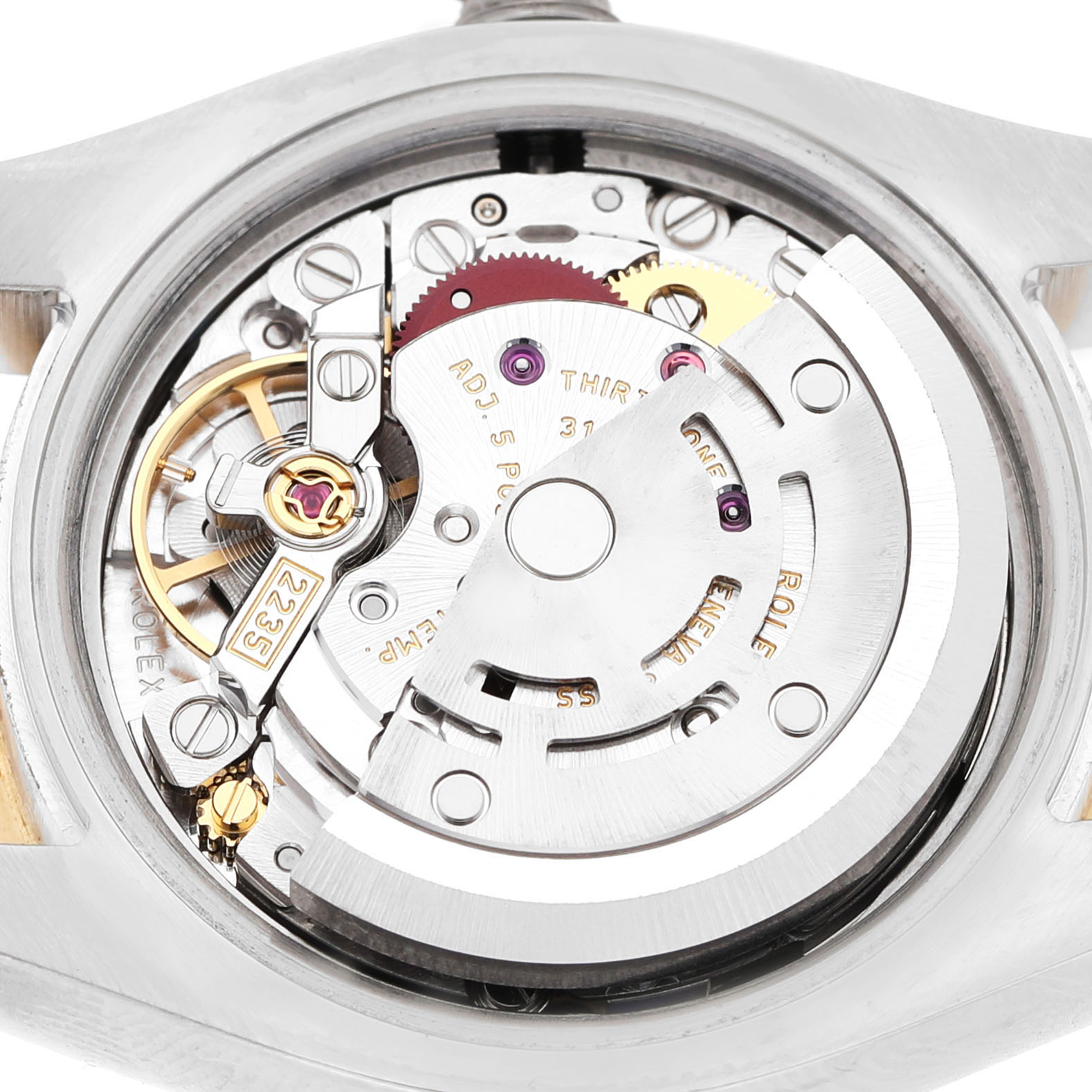 The image shows the internal movement of a Rolex Datejust 179383 Women's Steel and Gold (two tone) Silver Dial watch viewed from the back, highlighting gears and mechanisms.