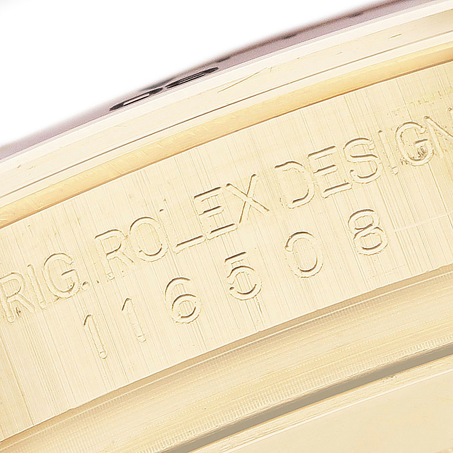 The image shows a close-up of the Rolex Daytona 116508 Men's Yellow Gold Black Dial model's engraved serial or reference number on its case.