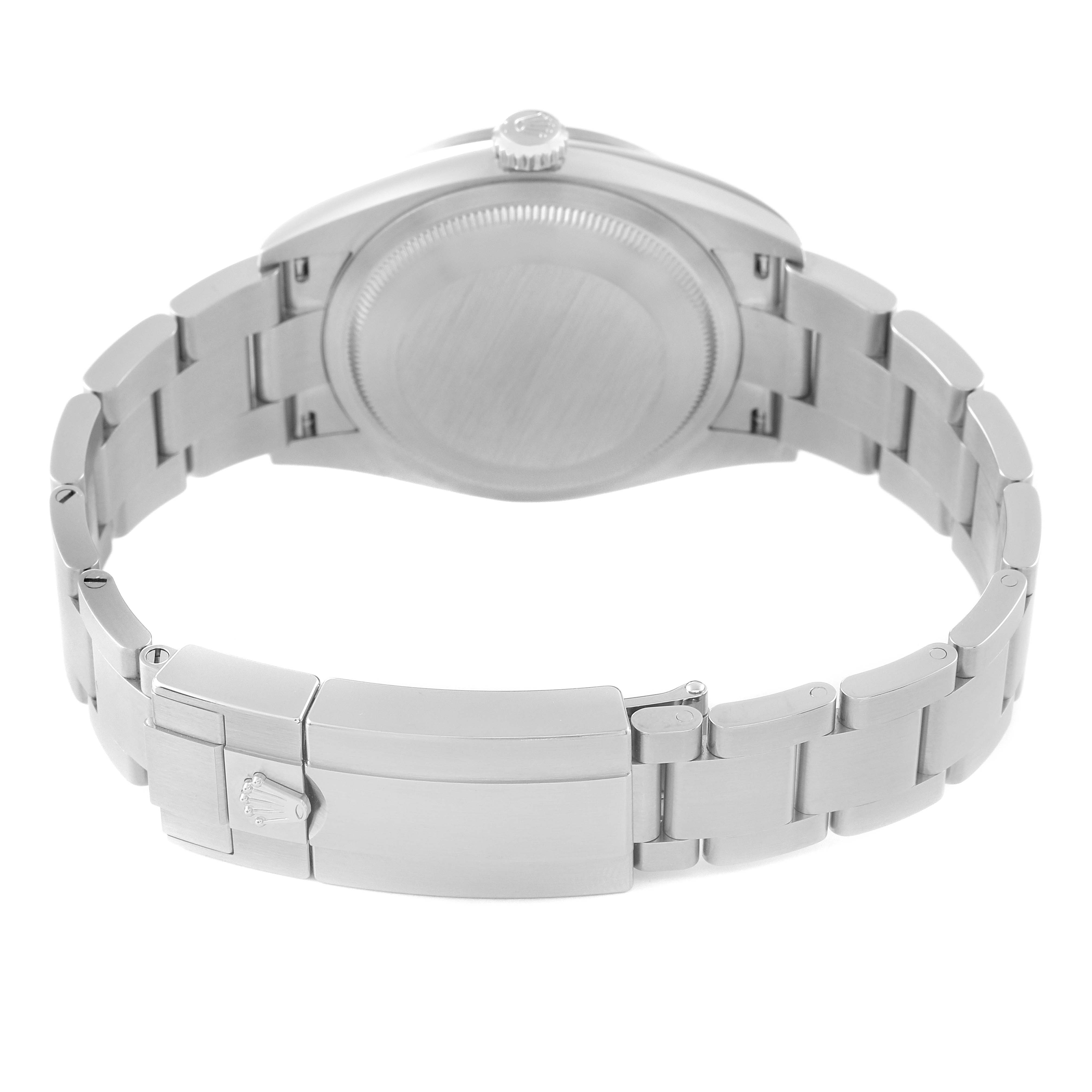 The image shows the back view of a Rolex Explorer 124270 Men
s Stainless Steel Black Dial 124270 Men
s Stainless Steel Black Dial watch, highlighting its bracelet and closed clasp.