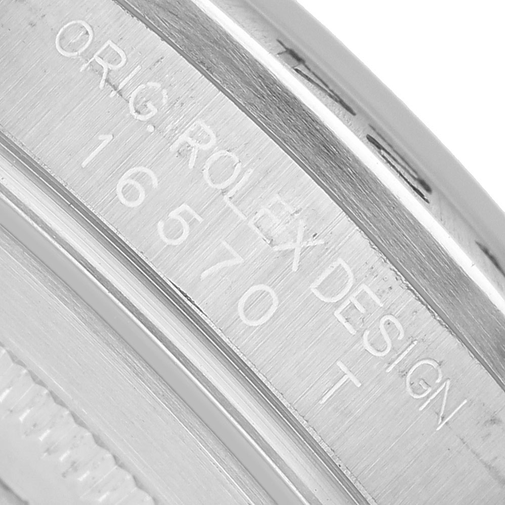 The image shows the side engraving on the case of a Rolex Explorer 16570 Men's Stainless Steel White Dial, detailing the model number.