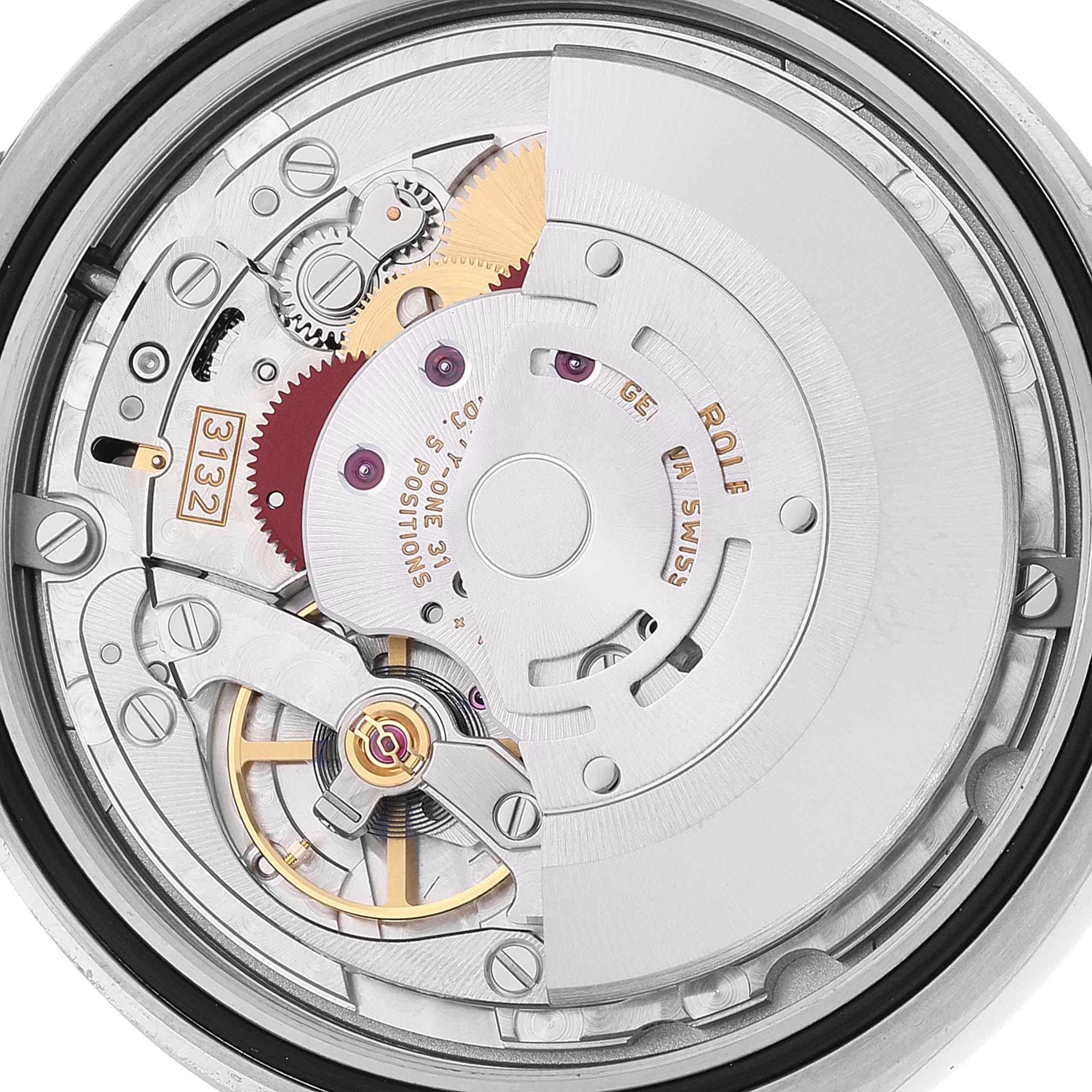 The image shows the internal mechanical movement of a Rolex Oyster Perpetual 114300 Men's Stainless Steel Grey Dial 114300 Men's Stainless Steel Grey Dial watch viewed from the back.