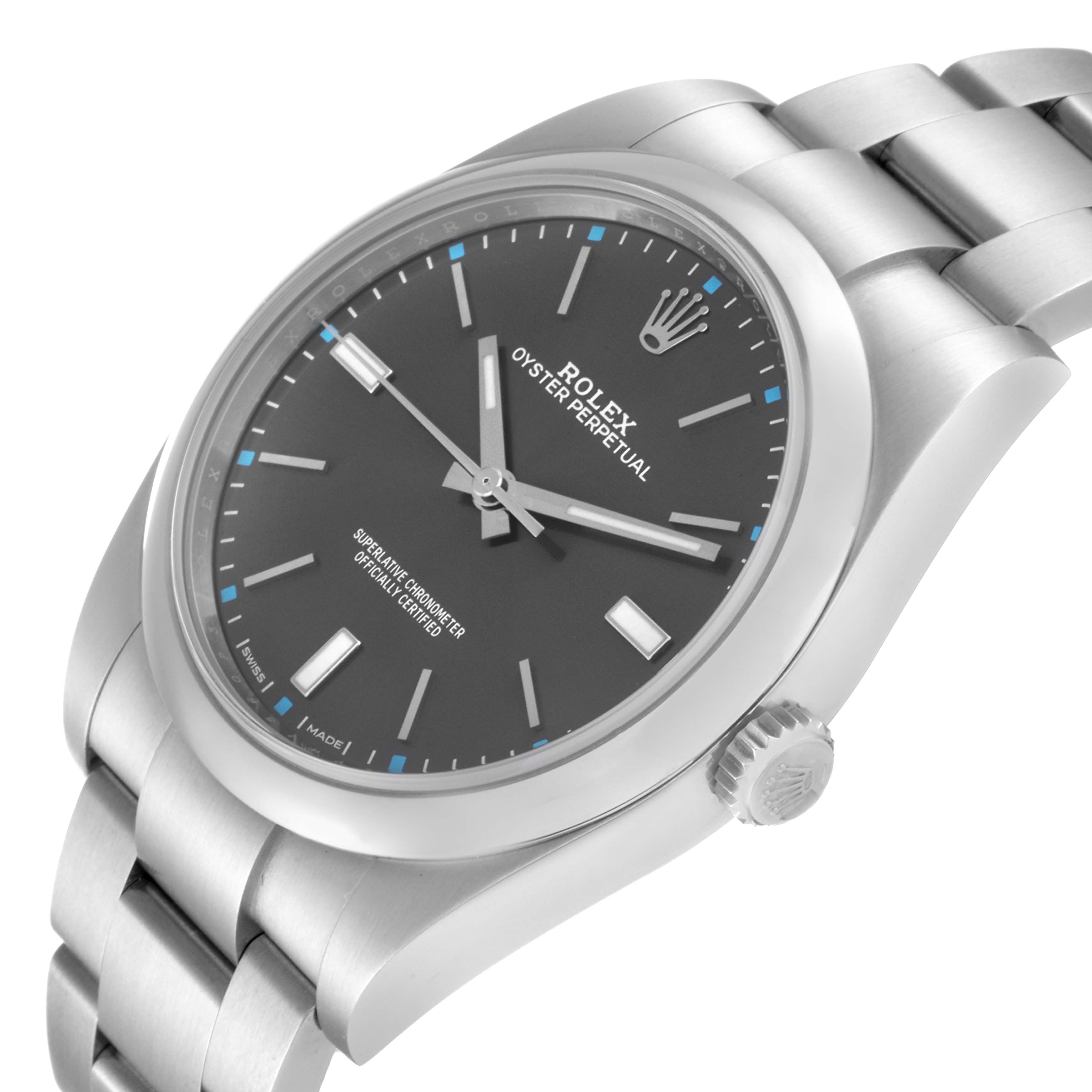 The image shows the Rolex Oyster Perpetual 114300 Men's Stainless Steel Grey Dial 114300 Men's Stainless Steel Grey Dial watch at a slight angle, highlighting its face, crown, and part of the bracelet.