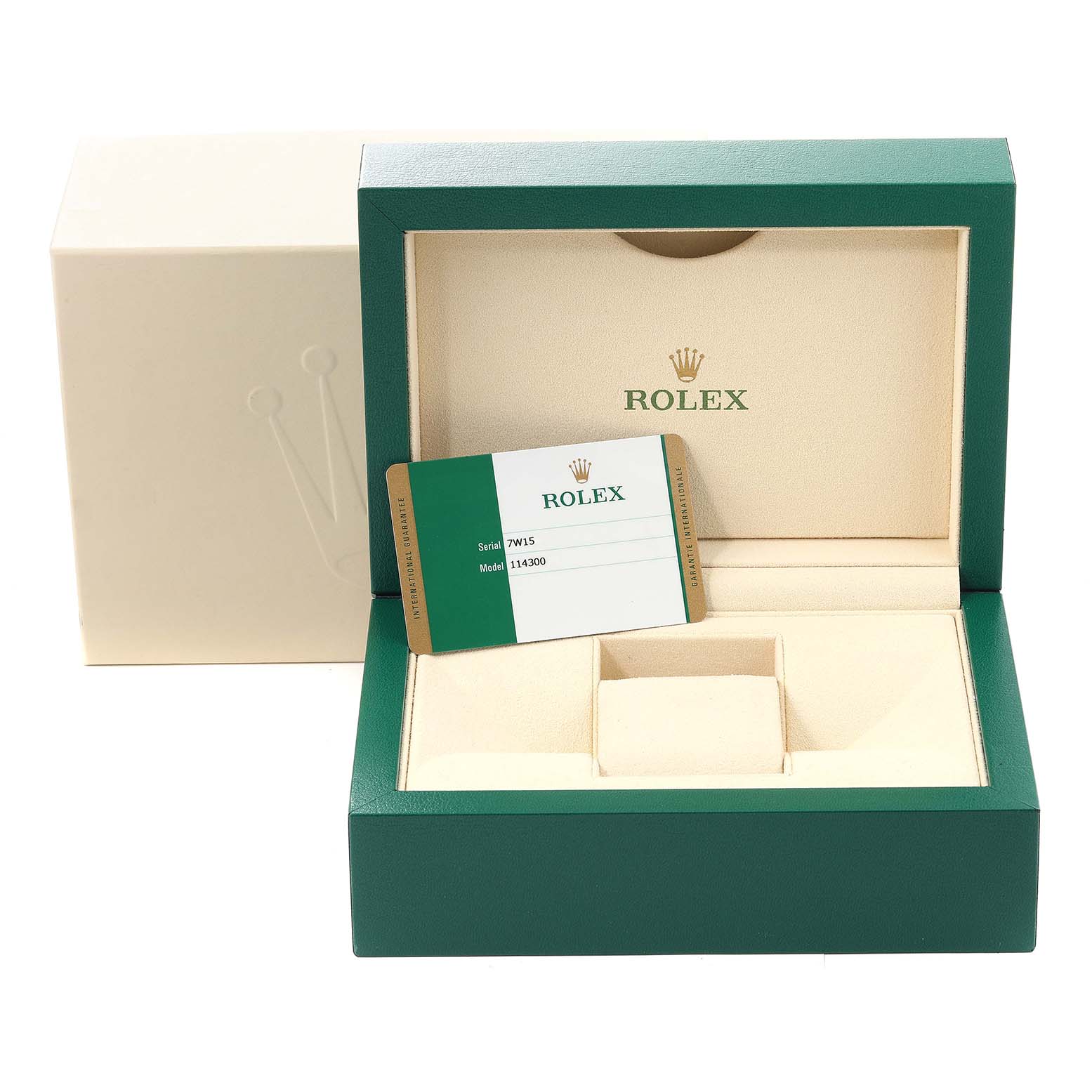 The image shows the packaging and guarantee card for a Rolex Oyster Perpetual 114300 Men's Stainless Steel Grey Dial 114300 Men's Stainless Steel Grey Dial watch, including the outer cream box and inner green display box.