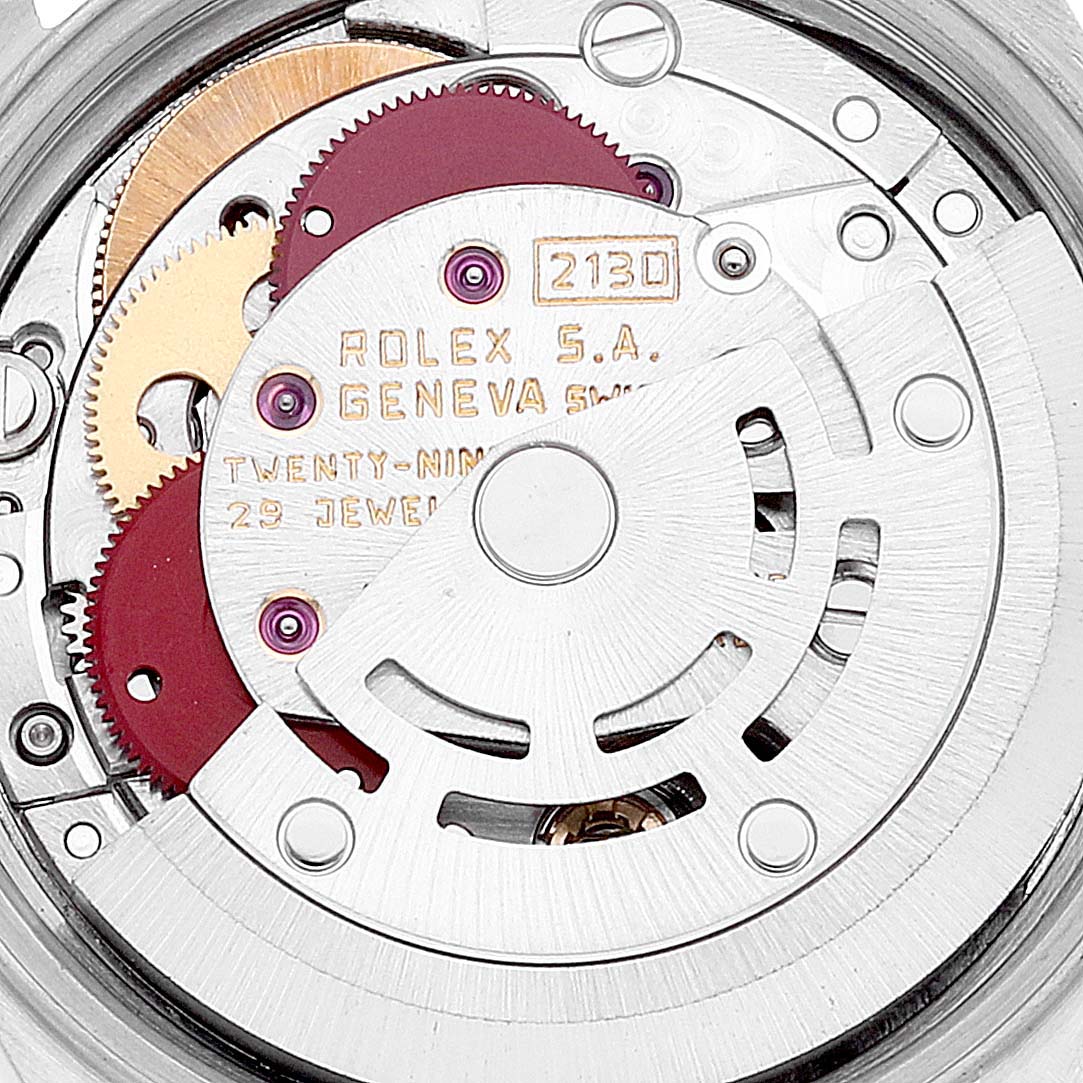 This image shows the internal movement mechanism of a Rolex Oyster Perpetual 67193 Women's Steel and Gold (two tone) Champagne Dial 67193 Women's Steel and Gold (two tone) Champagne Dial watch.
