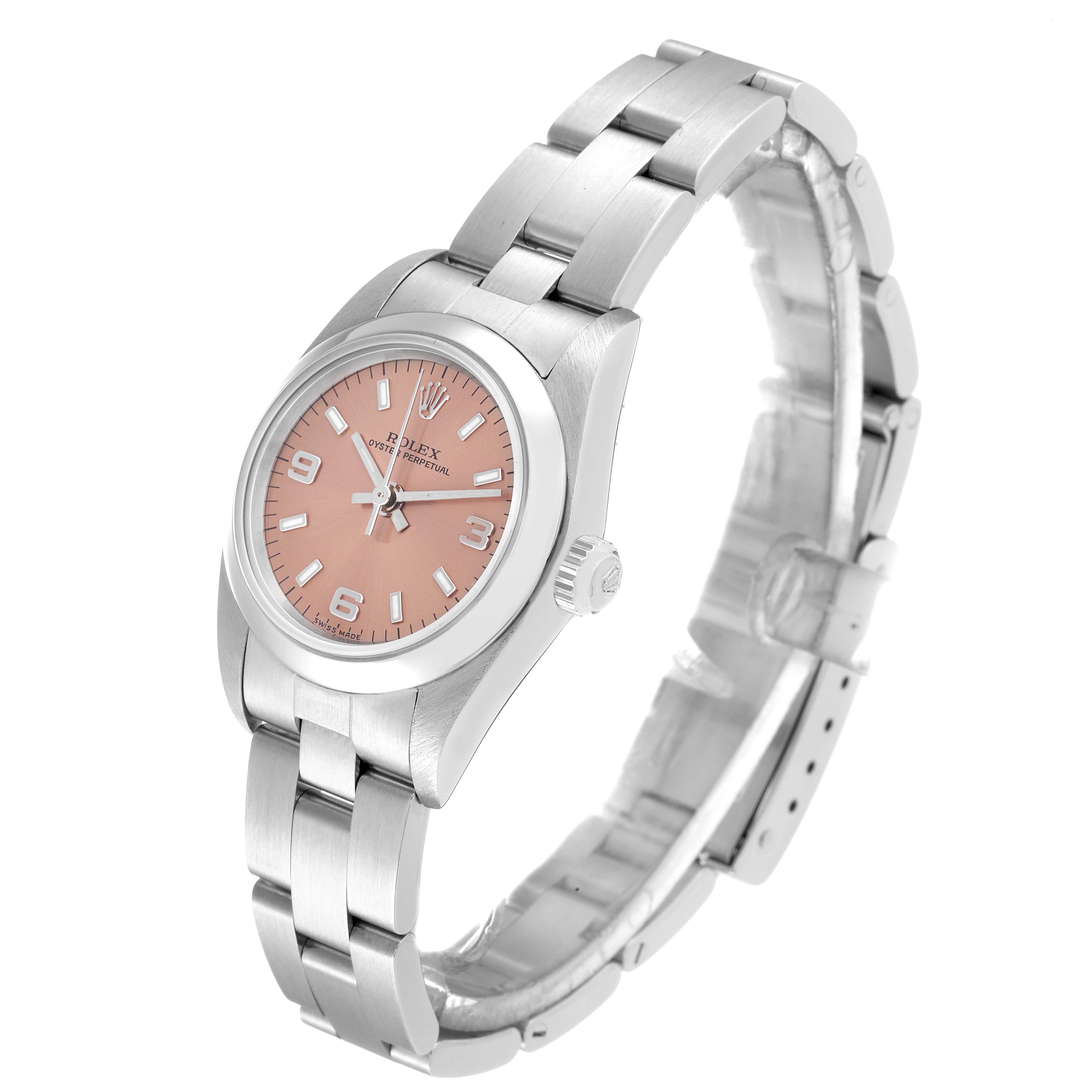 The Rolex Oyster Perpetual 76080 Women
s Stainless Steel Pink Dial 76080 Women
s Stainless Steel Pink Dial watch is shown at a three-quarter angle, highlighting its pink dial, case, crown, and bracelet.
