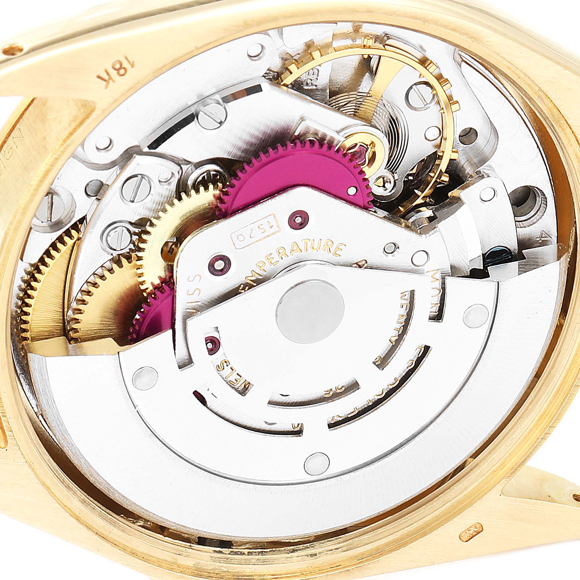 The image shows the internal mechanical parts and movement of a Rolex Vintage Collection 1002 Men's Yellow Gold Grey Dial 1002 Men's Yellow Gold Grey Dial watch at a close-up angle.