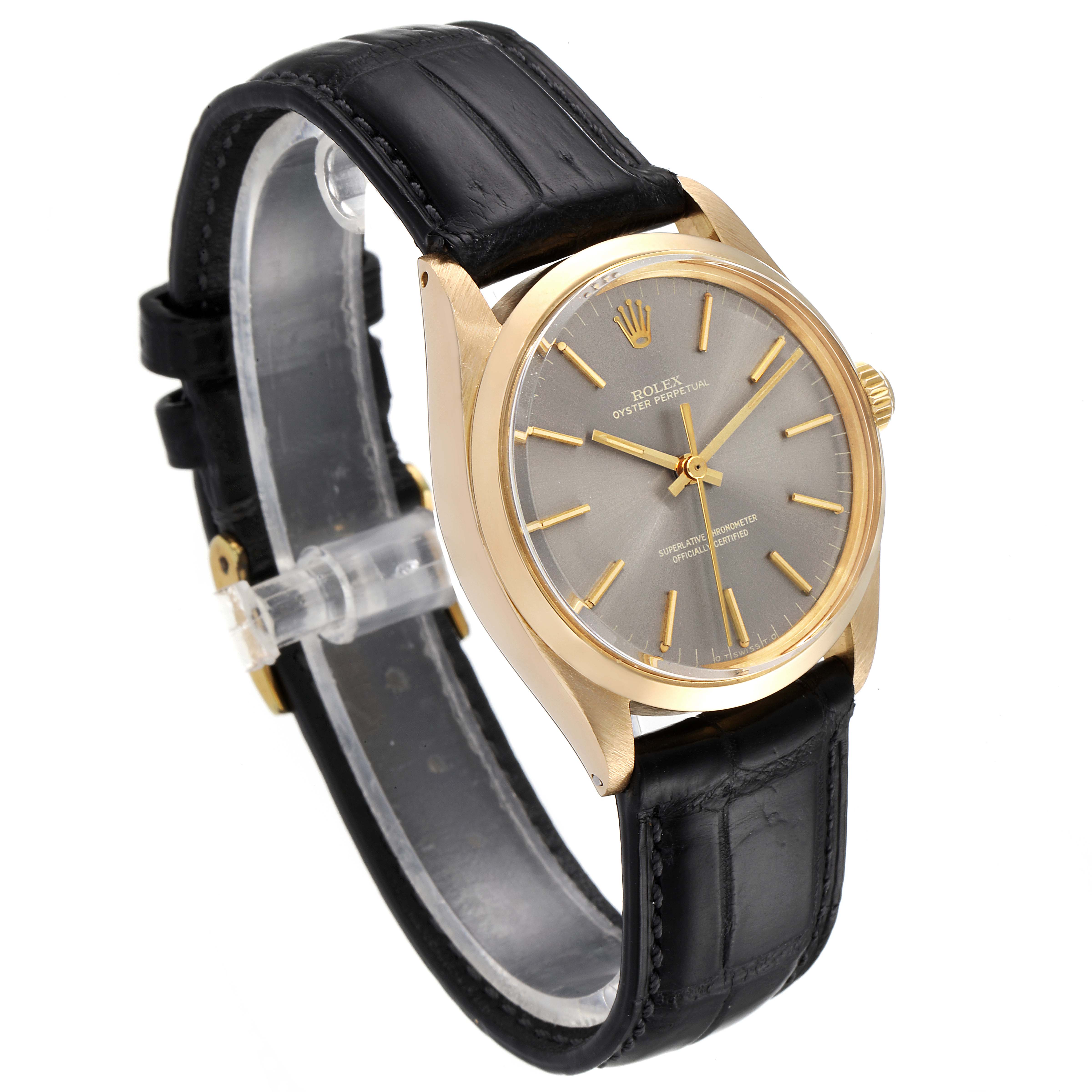 The image shows the Rolex Vintage Collection 1002 Men's Yellow Gold Grey Dial 1002 Men's Yellow Gold Grey Dial model watch at a three-quarter angle, highlighting its face, bezel, and leather strap.