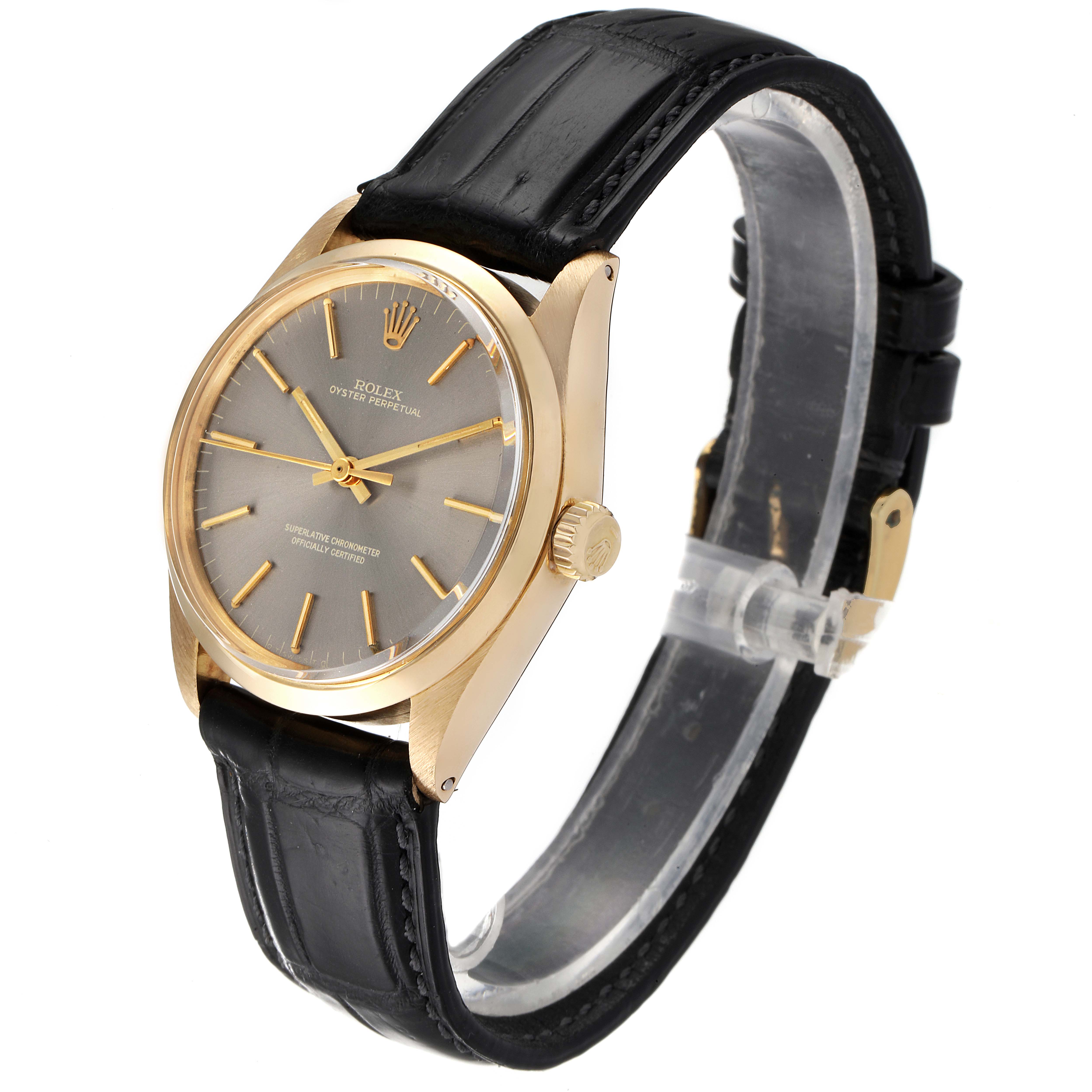 The Rolex Vintage Collection 1002 Men's Yellow Gold Grey Dial 1002 Men's Yellow Gold Grey Dial watch is shown at a slight side angle, highlighting its gold case, grey dial, and black leather strap.