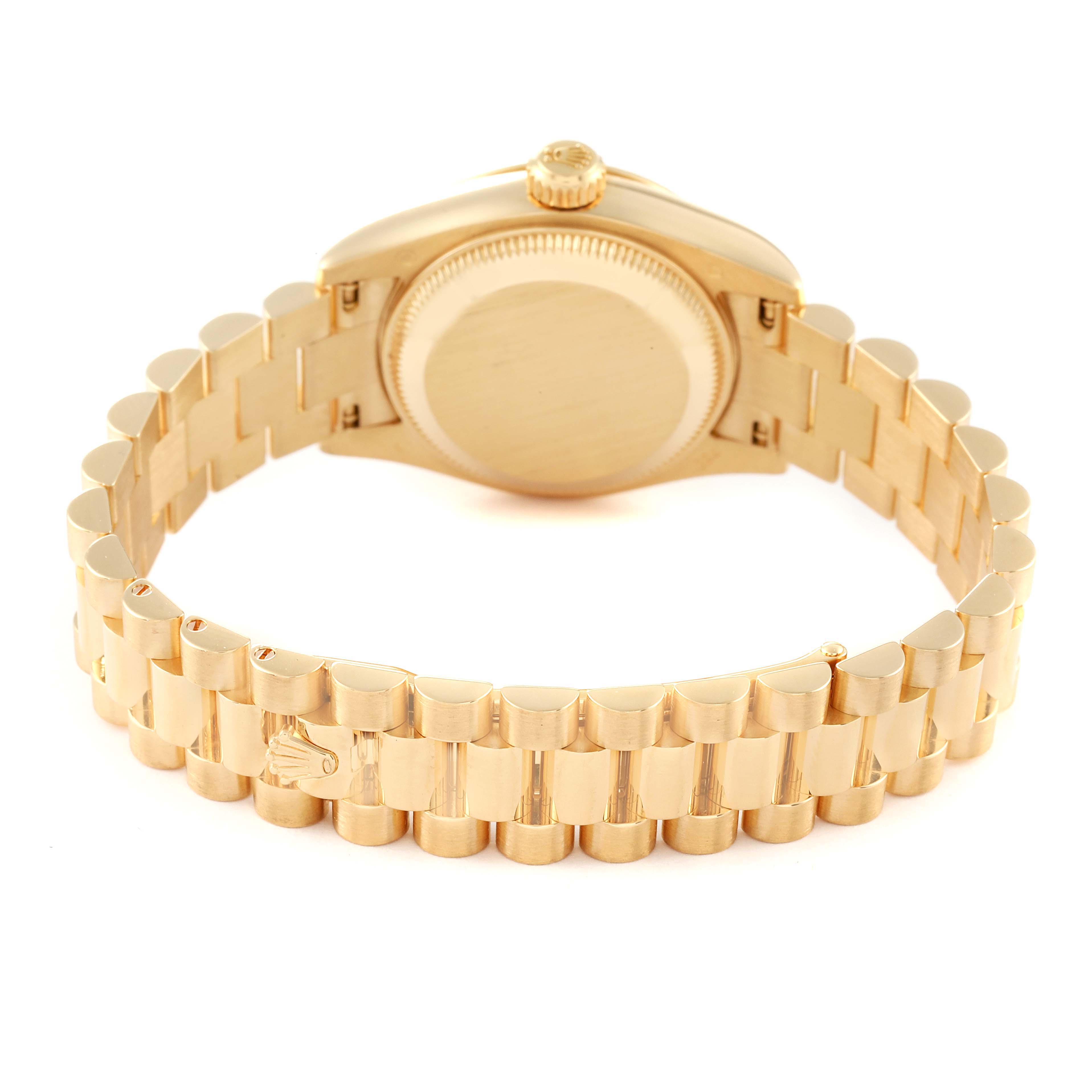 The image shows the back view of a Rolex President 179178 Women
s Yellow Gold Champagne Dial 179178 Women
s Yellow Gold Champagne Dial model watch, highlighting the case back and the bracelet with a clasp.