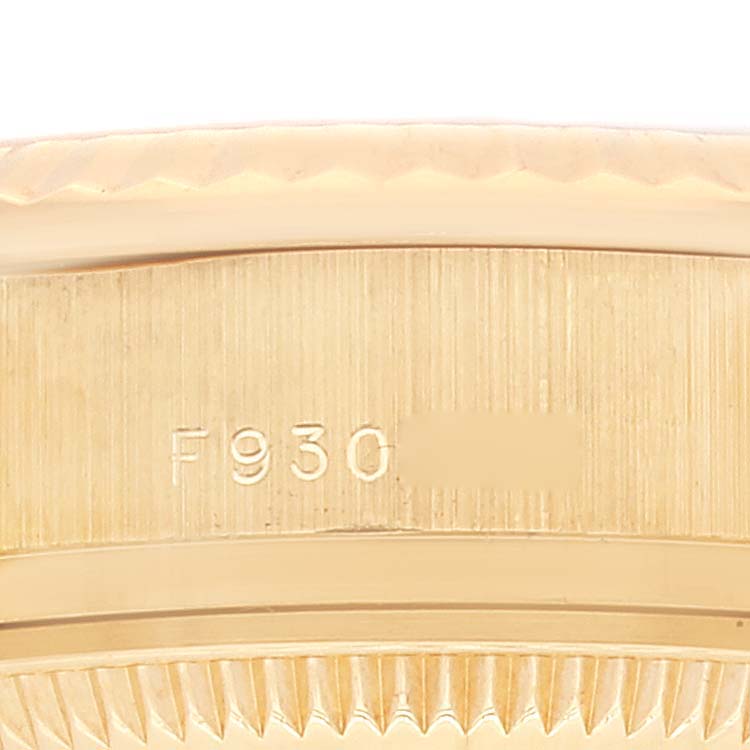 This image shows a close-up view of the case back serial number area of a Rolex President 179178 Women
s Yellow Gold Champagne Dial 179178 Women
s Yellow Gold Champagne Dial model.