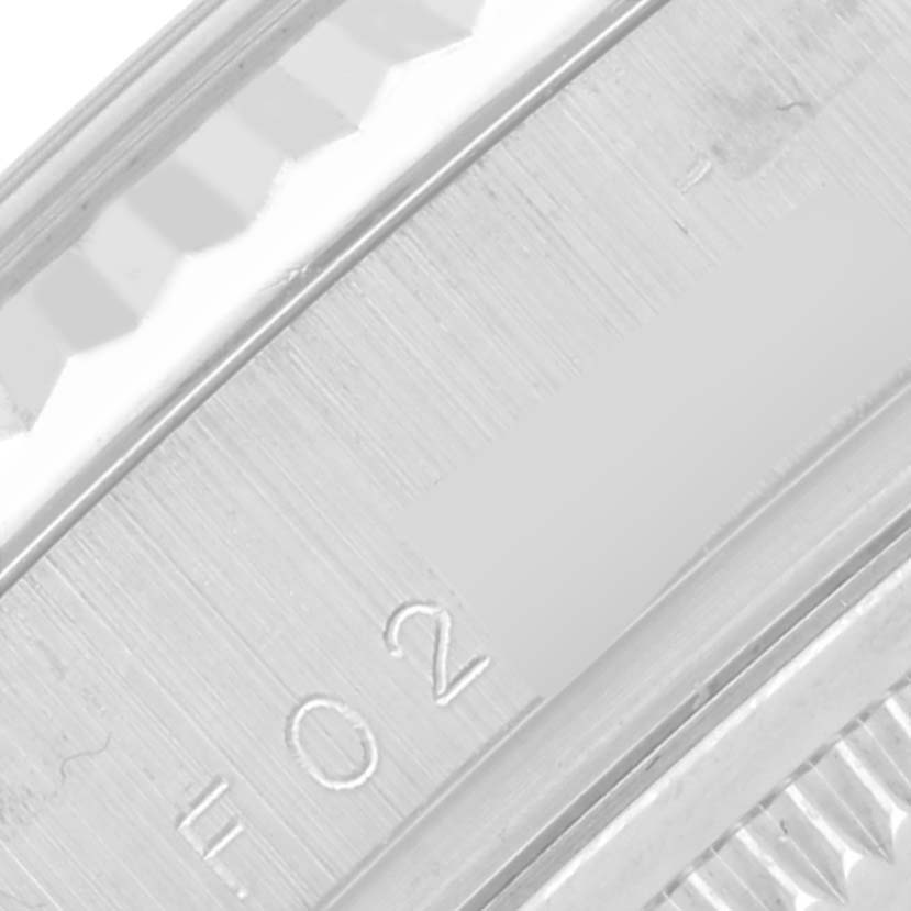 The image shows a close-up of the inner rim and bezel detailing of a Rolex President 118239A Men's White Gold Silver Dial 118239A Men's White Gold Silver Dial watch.