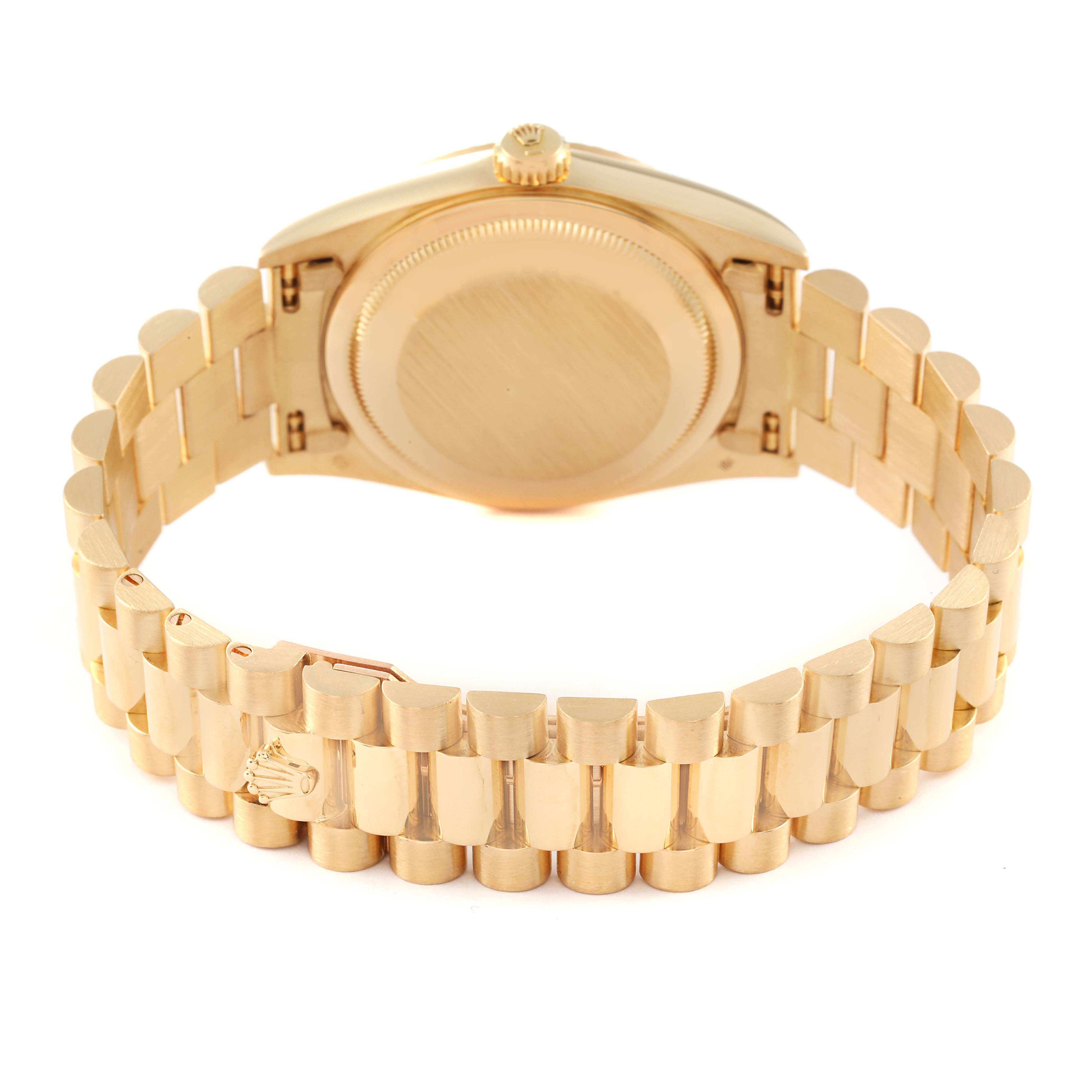 The Rolex President 18238 Men
s Yellow Gold Champagne Dial 18238 Men
s Yellow Gold Champagne Dial model watch is shown from the back, highlighting its gold case, crown, and bracelet.