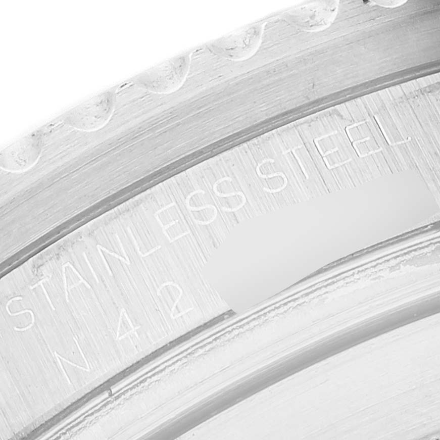 This close-up image shows a section of the rear casing with engravings of a Rolex Sea-Dweller 16600 Men's Stainless Steel Black Dial 16600 Men's Stainless Steel Black Dial watch.