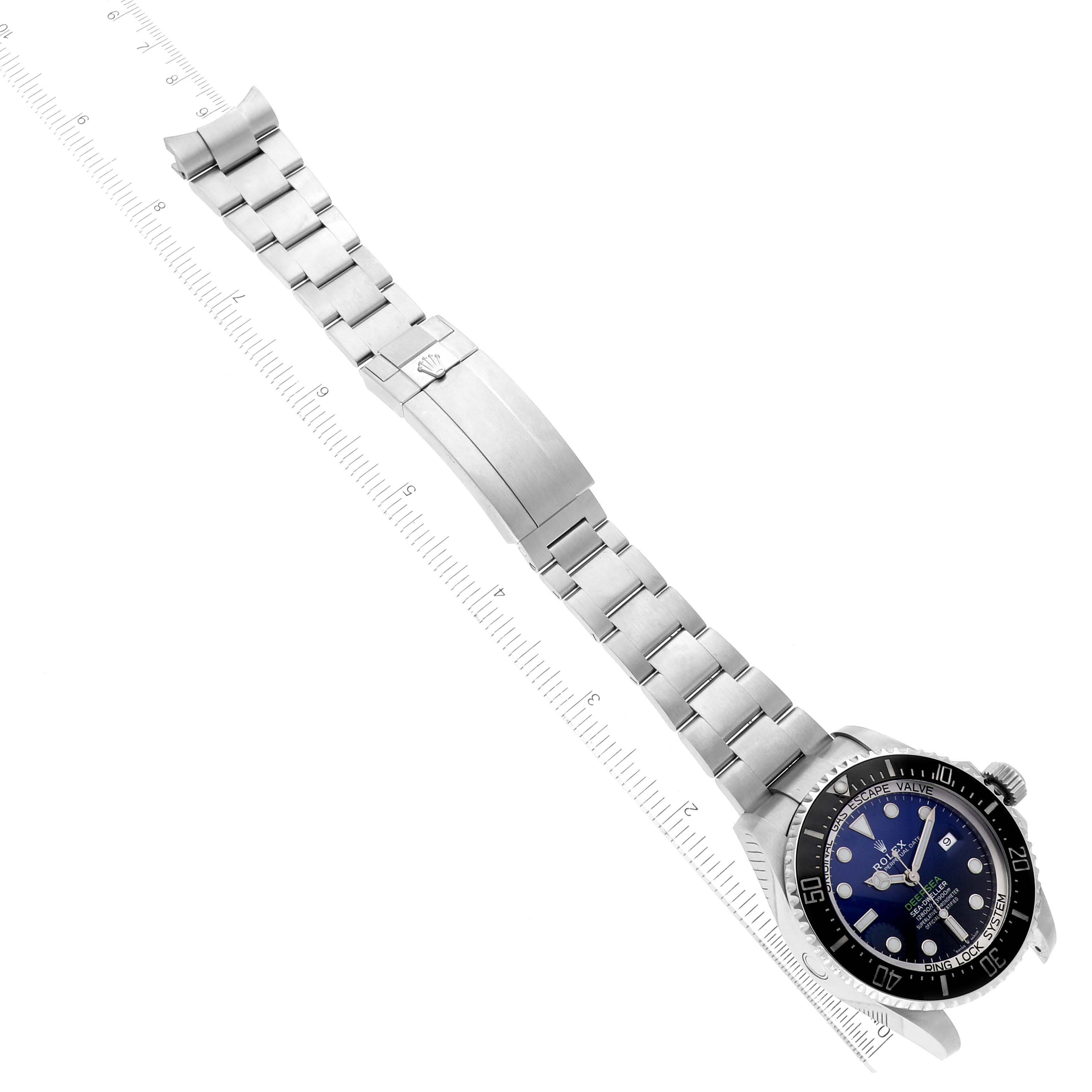 The Rolex Sea-Dweller 126660 Men's Stainless Steel Blue Dial 126660 Men's Stainless Steel Blue Dial watch is shown from an angled top view, displaying the face and full metal bracelet.