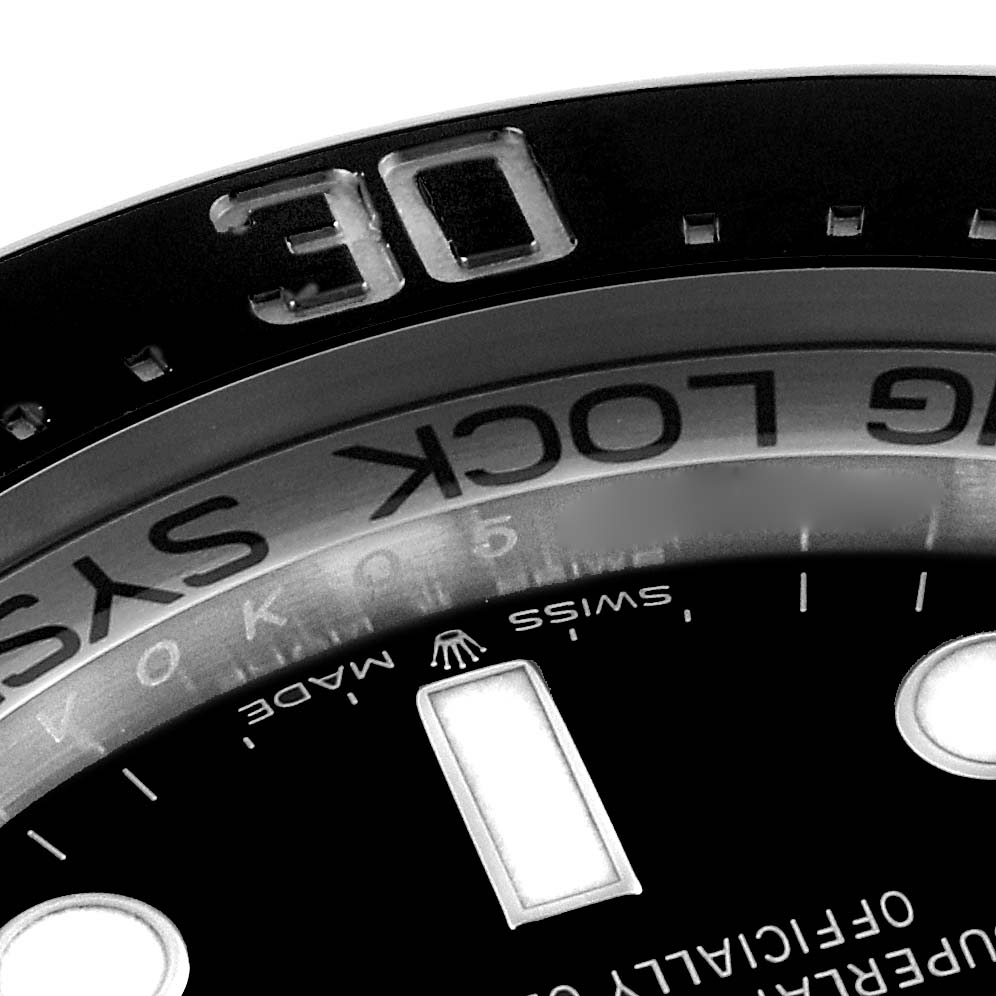 This image shows a close-up of the bezel and dial edge of a Rolex Sea-Dweller 126660 Men's Stainless Steel Blue Dial 126660 Men's Stainless Steel Blue Dial watch, focusing on the "30" mark and part of the text.
