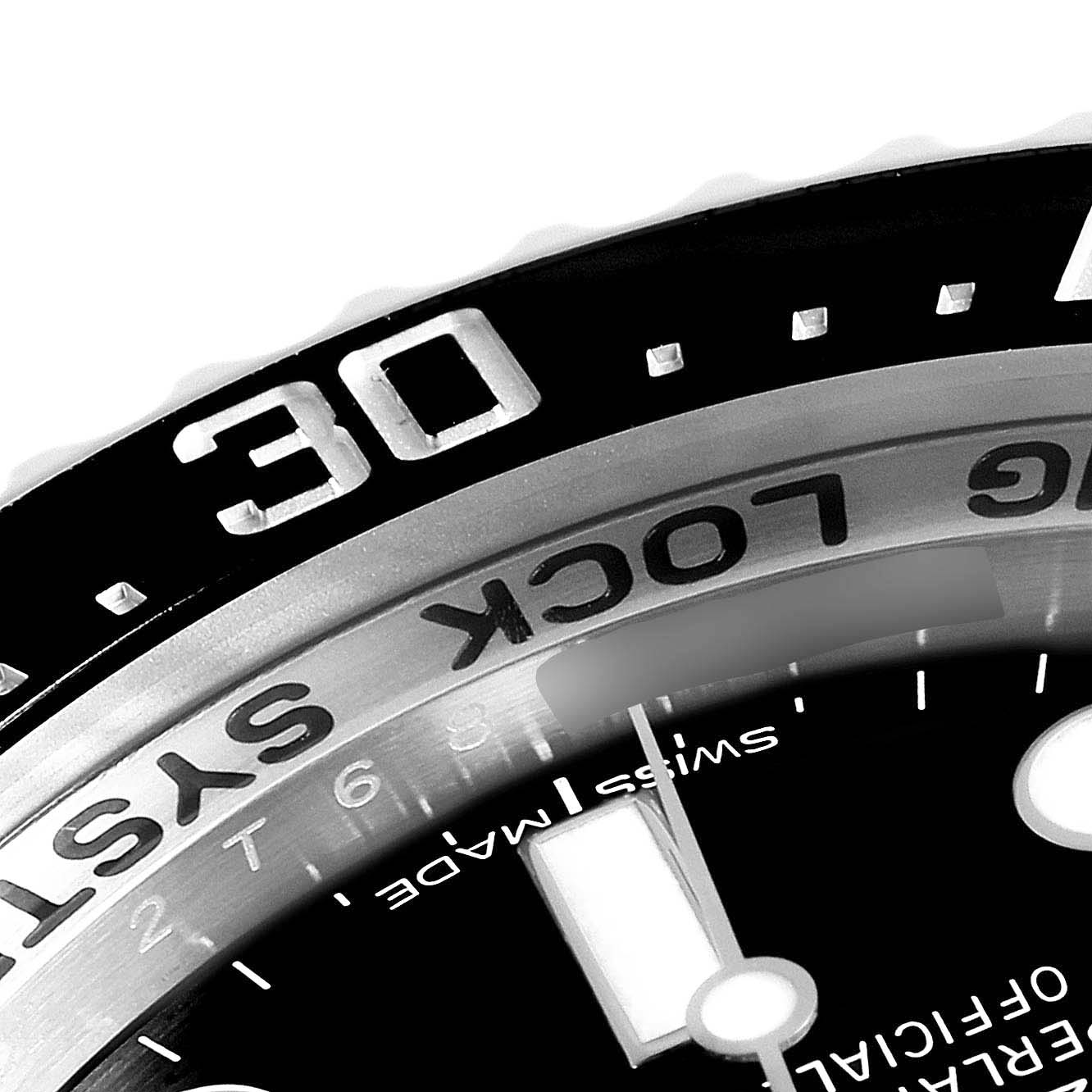 Close-up of the Rolex Sea-Dweller 116660 Men's Stainless Steel Blue Dial 116660 Men's Stainless Steel Blue Dial, showing the bezel, part of the dial, and bezel markings.