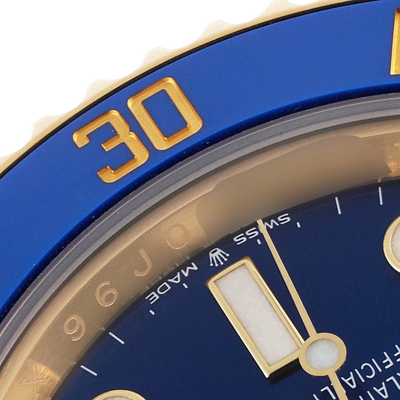 This image shows a close-up of the dial and bezel of a Rolex Submariner 126618 Men's Yellow Gold Black Dial 126618 Men's Yellow Gold Black Dial, highlighting the "30" minute marker.