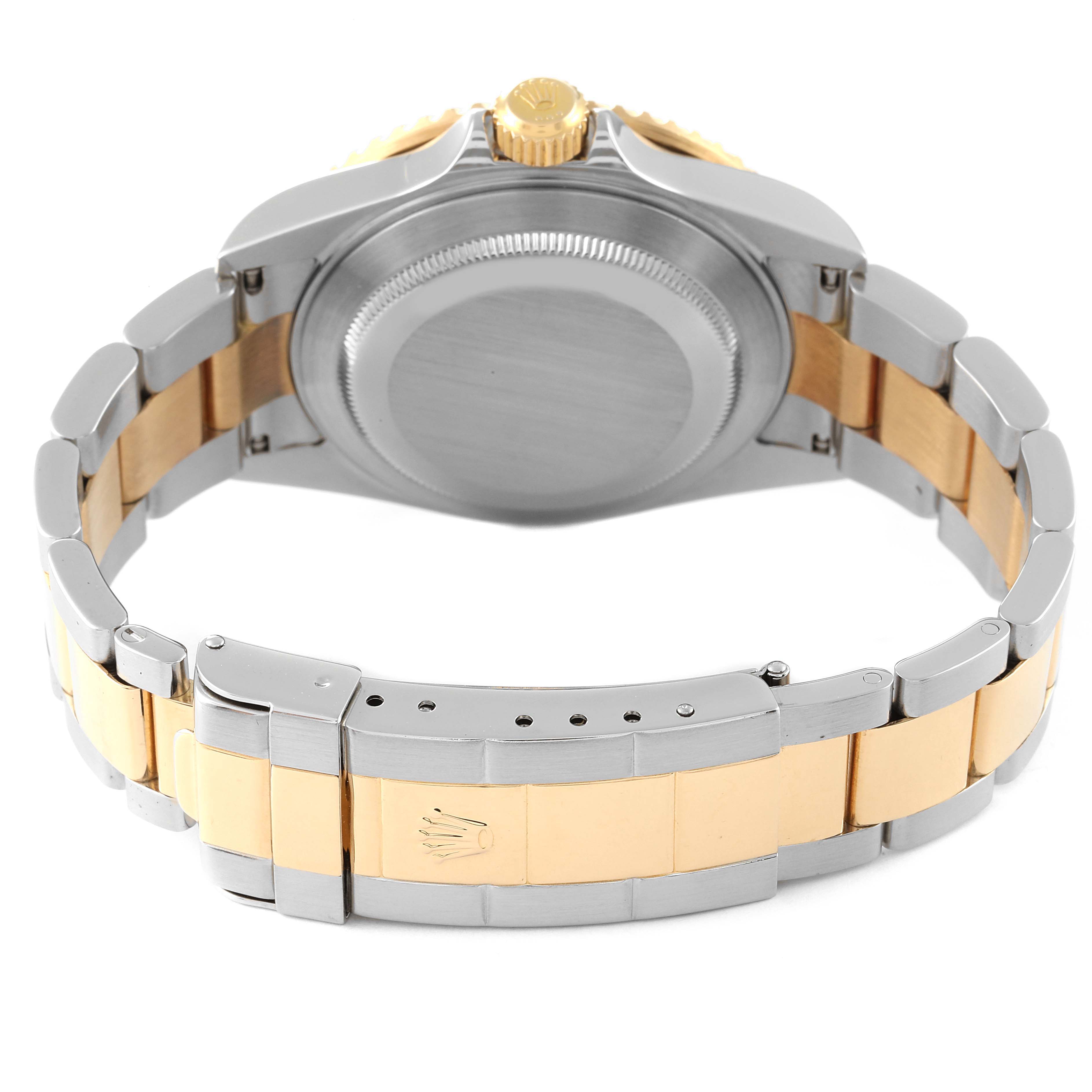 The image shows the back angle of a Rolex Submariner 16613 Men
s Steel and Gold (two tone) Blue Dial 16613 Men
s Steel and Gold (two tone) Blue Dial watch, highlighting the clasp, crown, and bracelet, featuring a two-tone metal design.