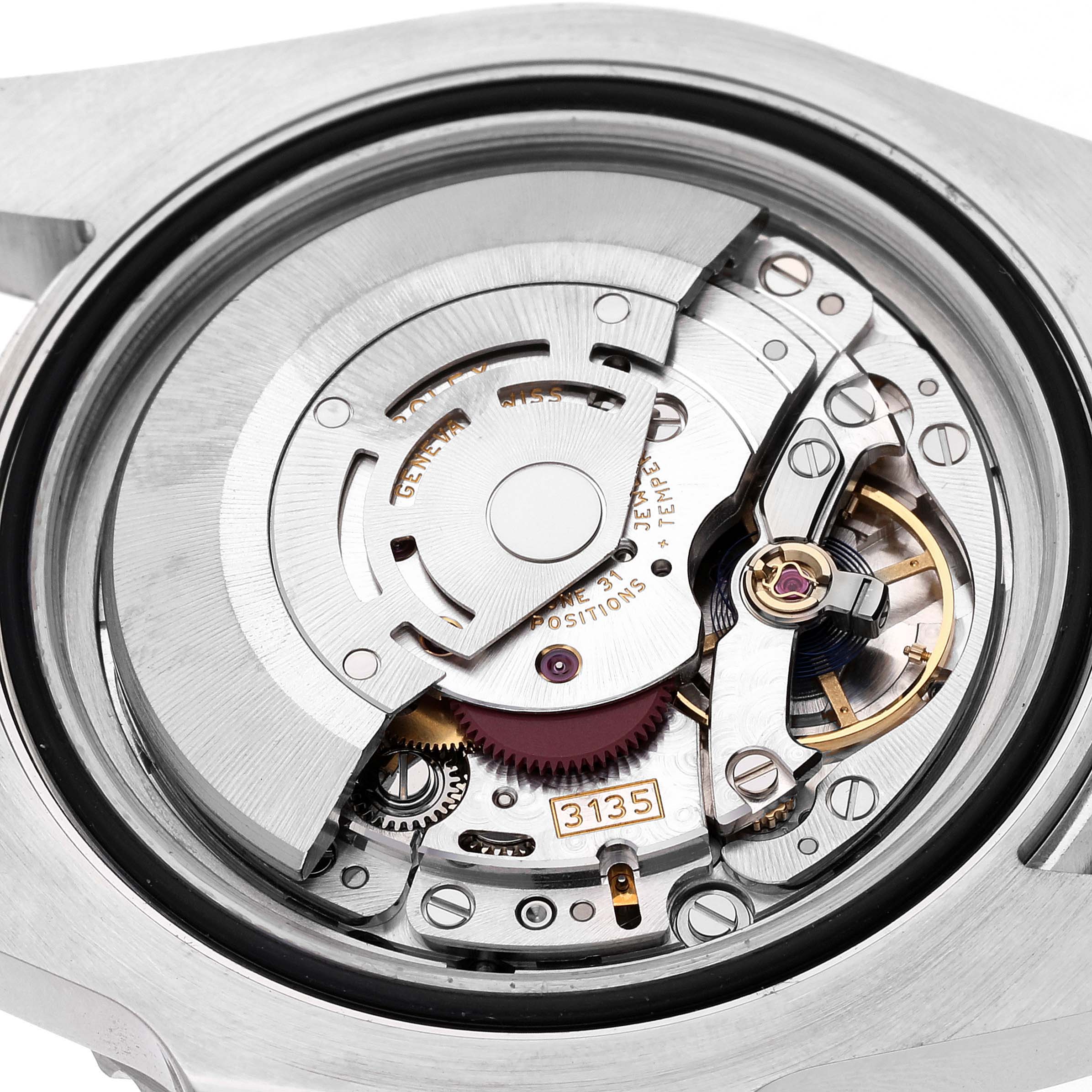 The image shows a close-up of the movement mechanism inside a Rolex Submariner 116610 Men
s Stainless Steel Black Dial 116610 Men
s Stainless Steel Black Dial watch.