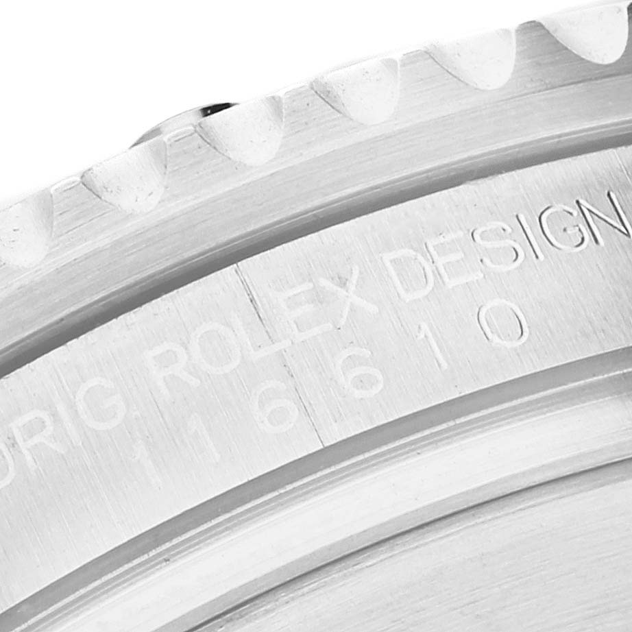 This image shows a close-up of the engraved side of the bezel and case of a Rolex Submariner 116610 Men
s Stainless Steel Black Dial 116610 Men
s Stainless Steel Black Dial watch.