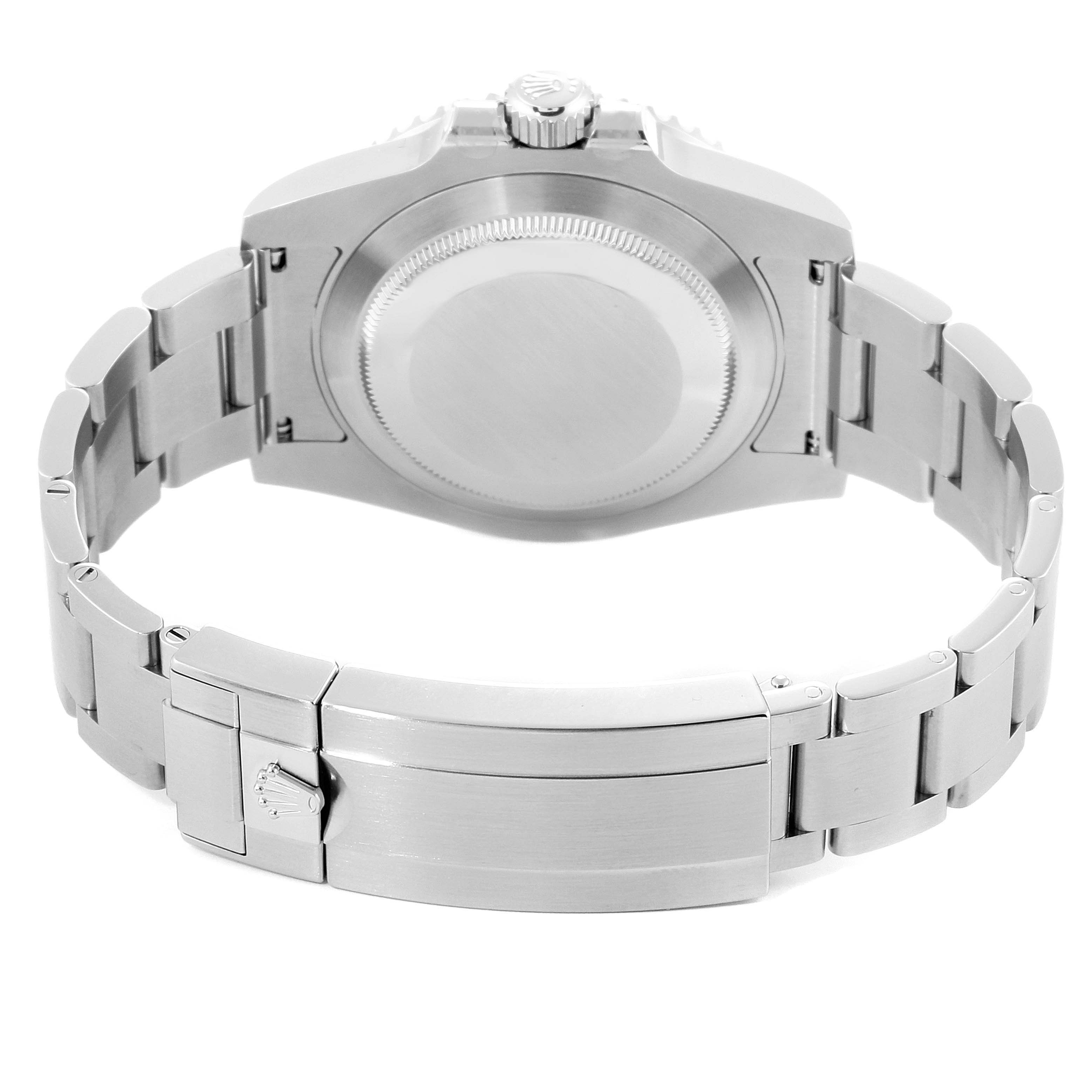 The image shows the backside and the bracelet clasp of a Rolex Submariner 116610LV Men's Stainless Steel Green Dial 116610LV Men's Stainless Steel Green Dial watch.