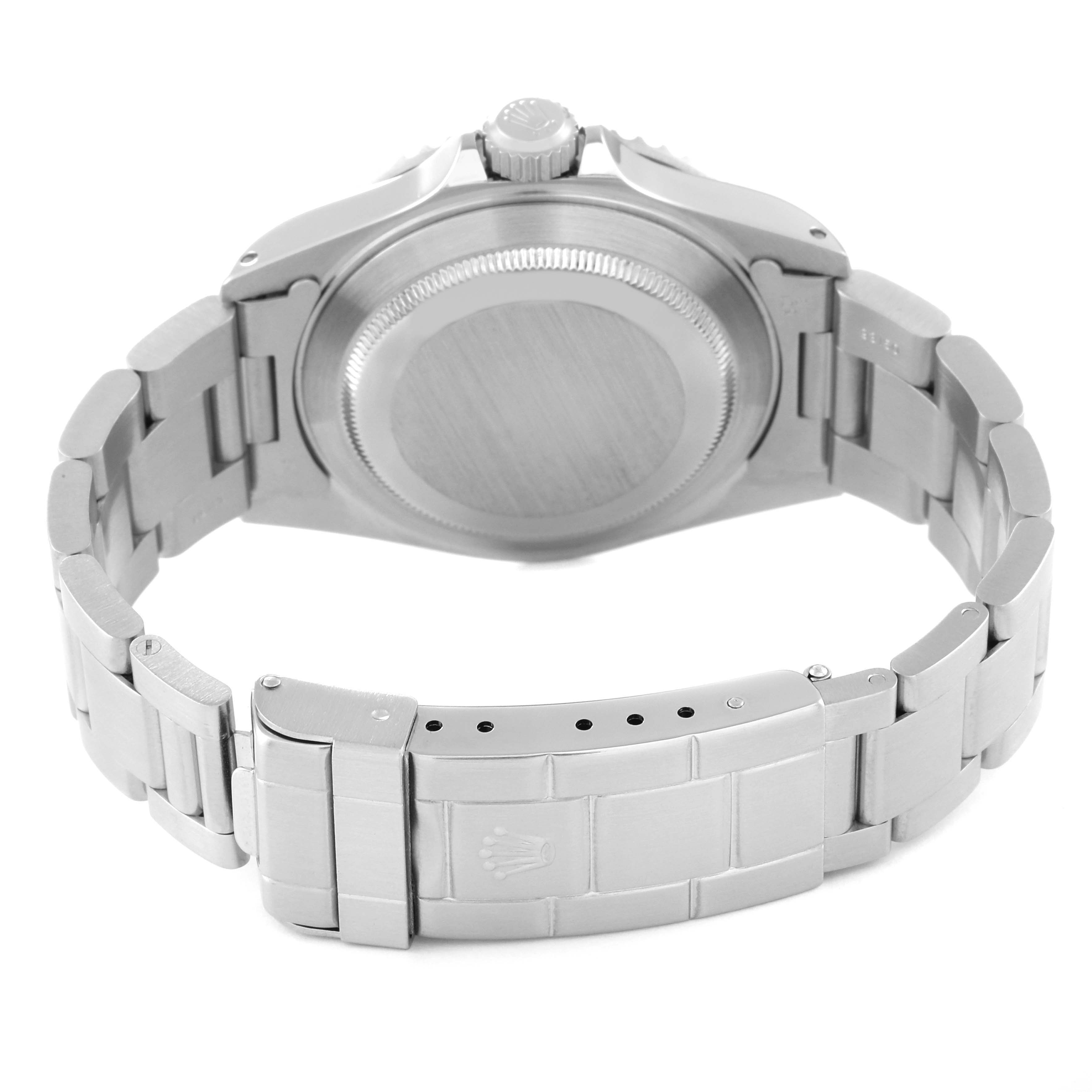 The image shows the back case and bracelet clasp of the Rolex Submariner 14060 Men
s Stainless Steel Black Dial 14060 Men
s Stainless Steel Black Dial watch from a rear angle.