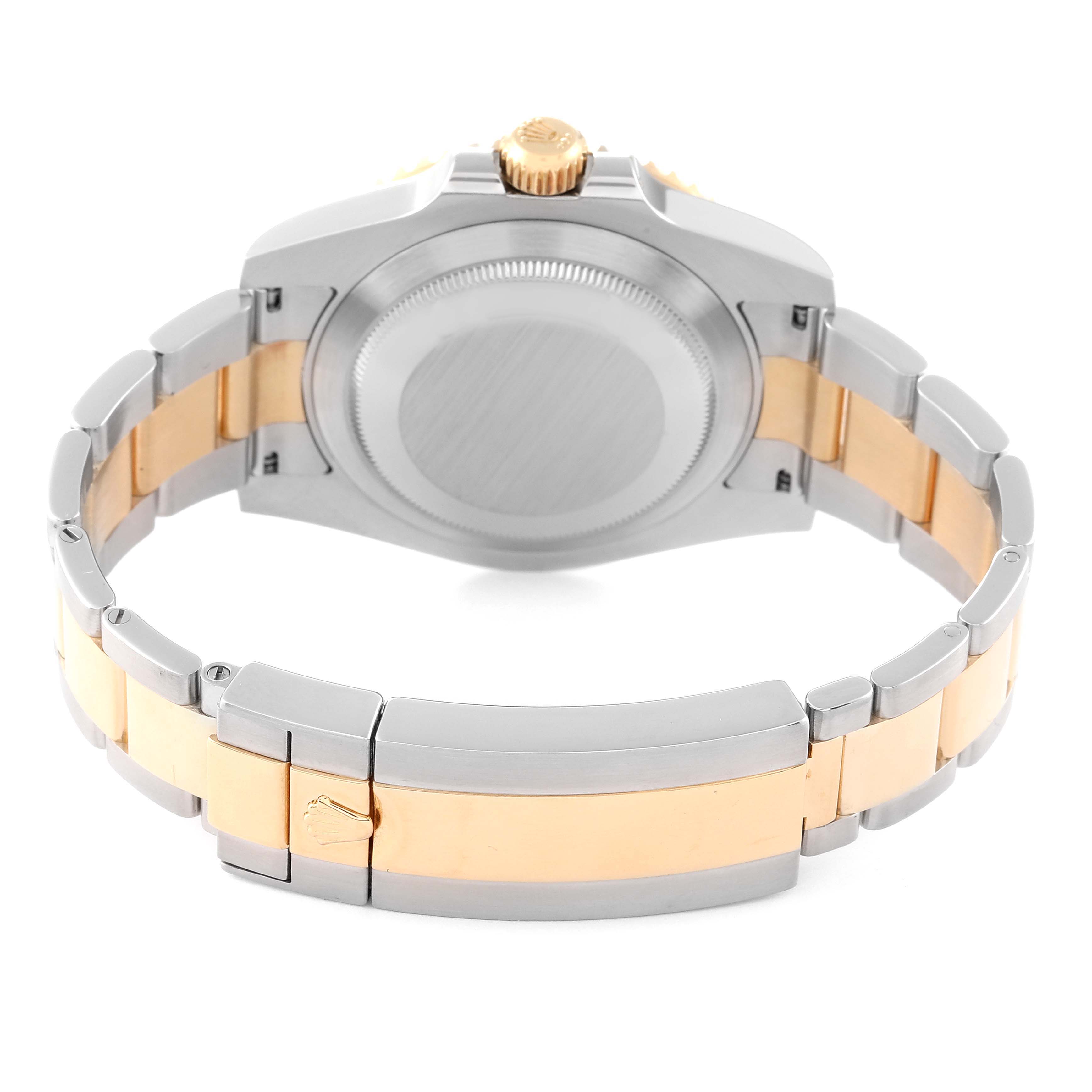 This image shows the back case and bracelet of the Rolex Submariner 116613 Men's Steel and Gold (two tone) Black Dial 116613 Men's Steel and Gold (two tone) Black Dial watch from a rear angle.