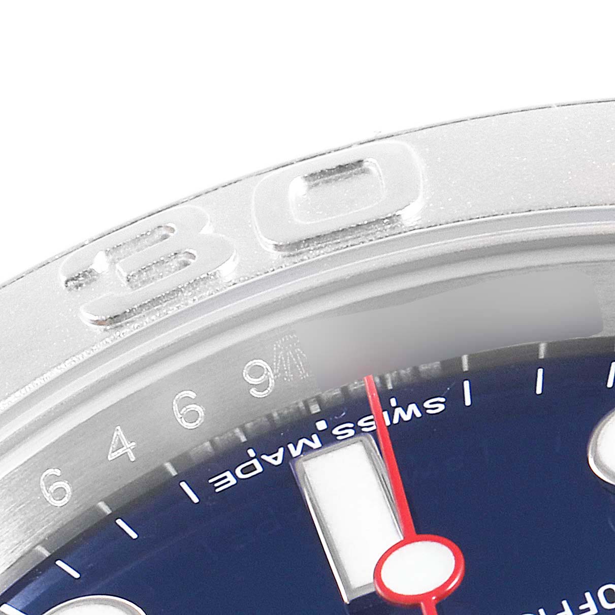 The image shows a close-up of the bezel, hour markers, and a portion of the dial of a Rolex Yacht-Master 116622 Men
s Stainless Steel Blue Dial 116622 Men
s Stainless Steel Blue Dial watch.