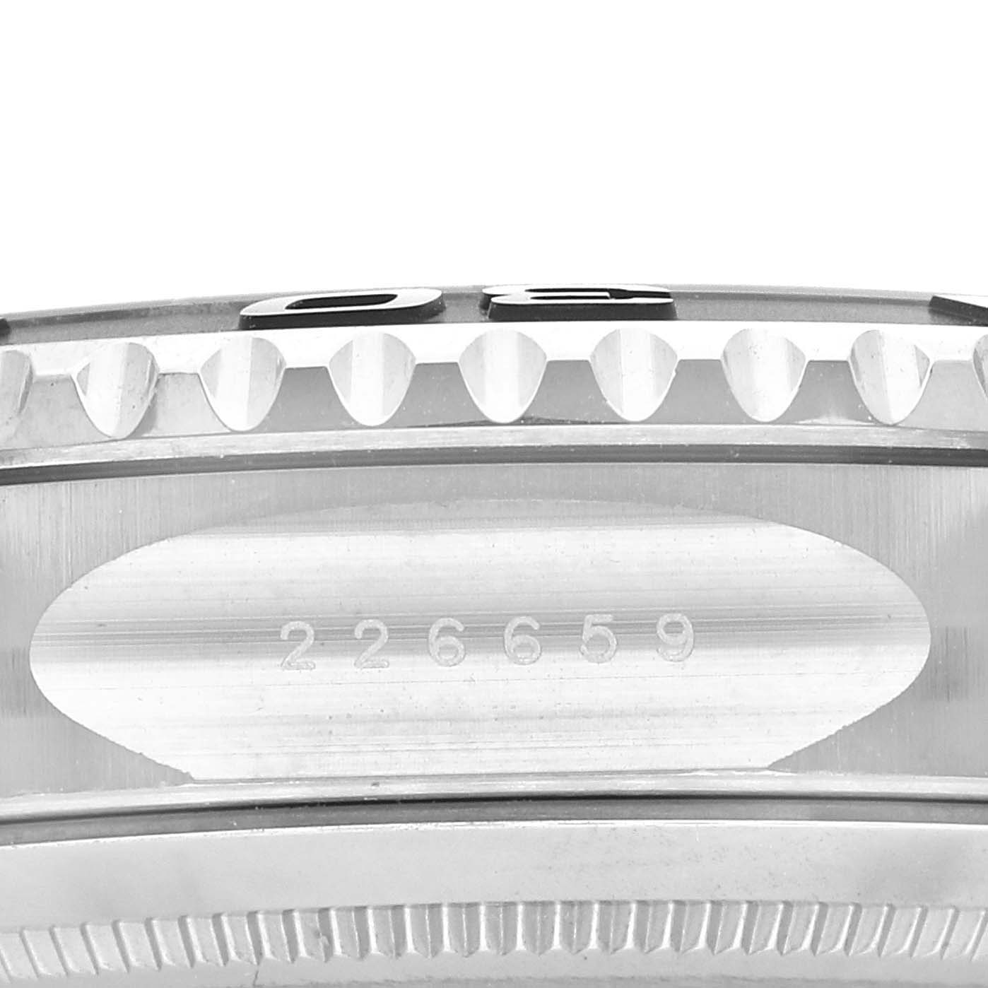 This image shows a close-up side angle of the Rolex Yacht-Master 226659 Men's White Gold Black Dial 226659 Men's White Gold Black Dial model's bezel and serial number.