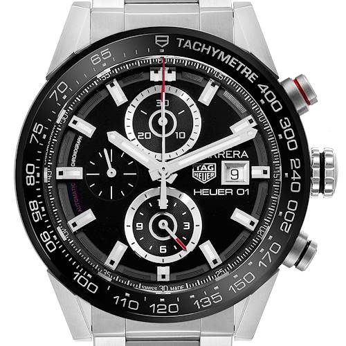 The image shows a front view of the Tag Heuer Carrera model watch displaying its tachymeter, chronograph dials, date window, and brand logos.