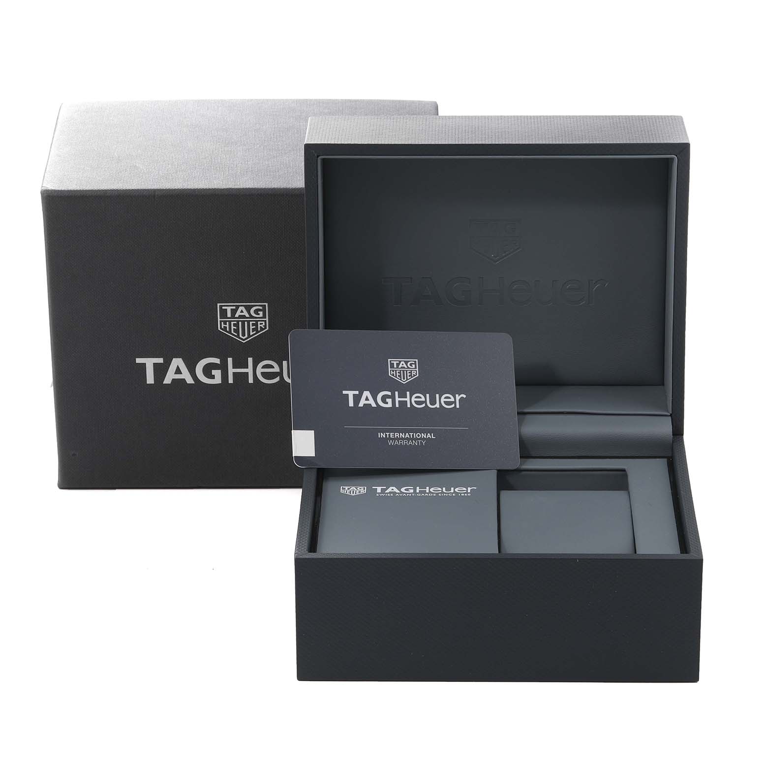 The image shows the box and international warranty card for a Tag Heuer Formula 1 CAZ2012.BA0876 Men's Stainless Steel Grey Dial CAZ2012.BA0876 Men's Stainless Steel Grey Dial watch from a front angle.