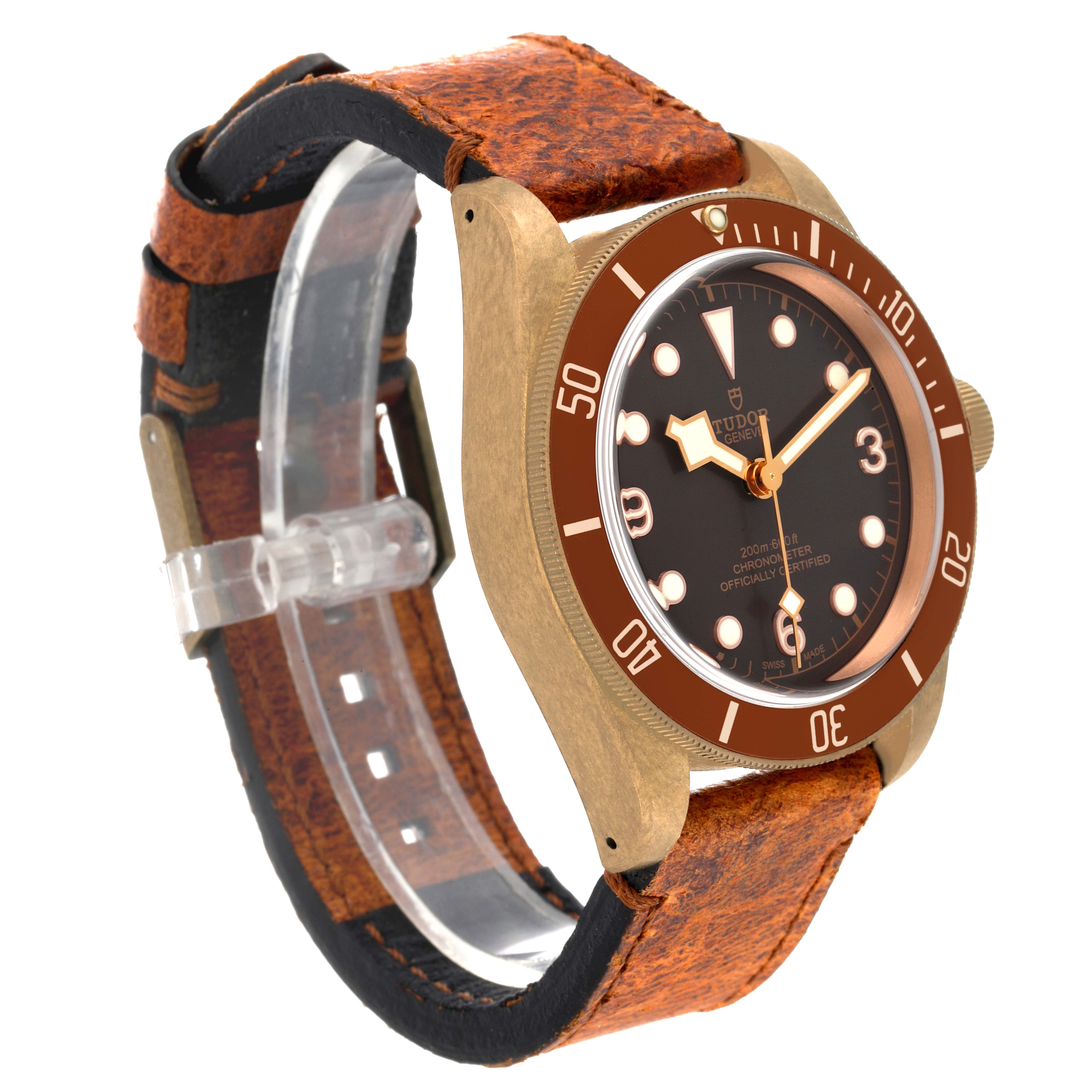 The Tudor Heritage Black Bay 79250B Men's Bronze Brown Dial 79250B Men's Bronze Brown Dial watch is shown at an angle displaying the face, bezel, crown, and leather strap.