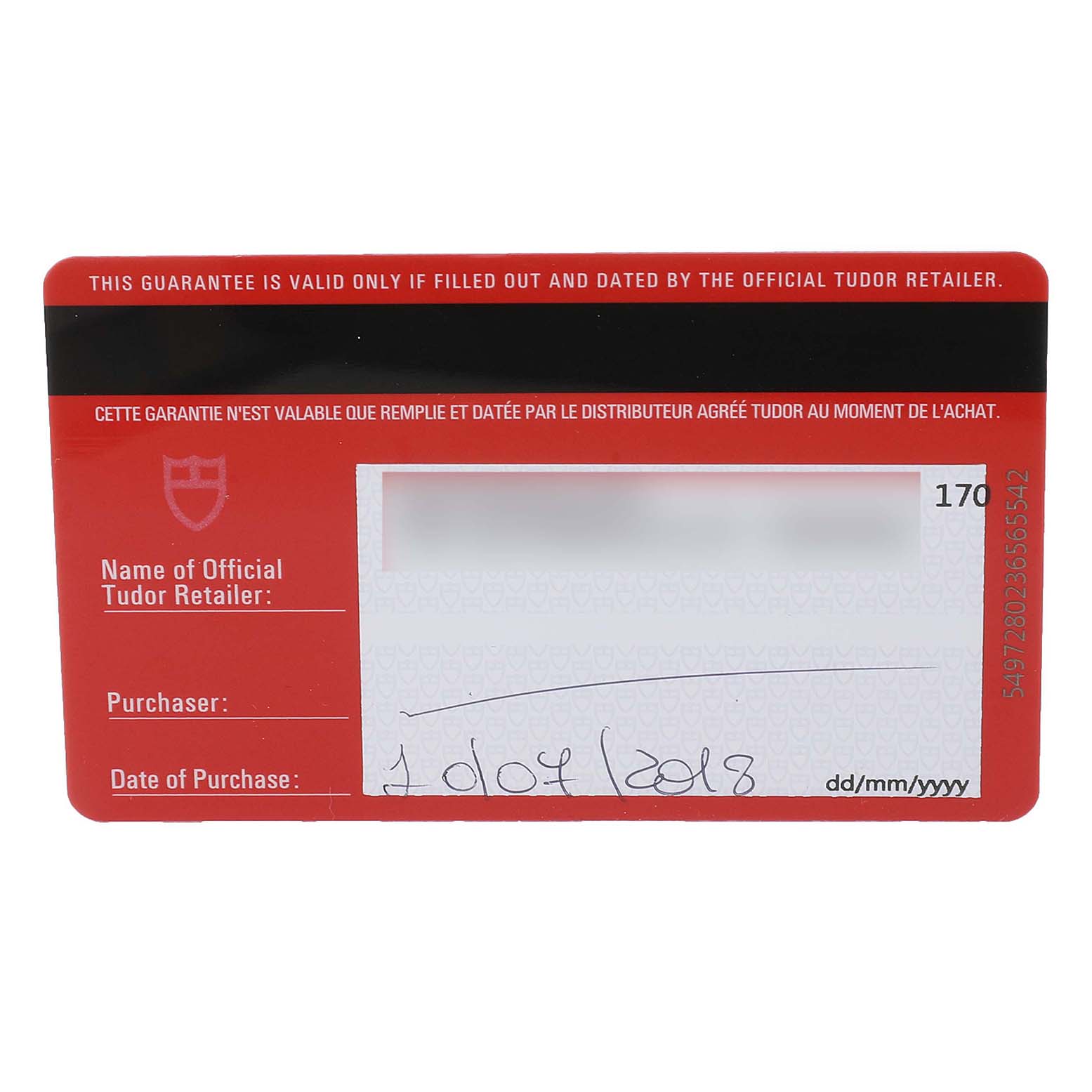 The image shows a Tudor guarantee card for the Heritage Black Bay model, including fields for the retailer's name, purchaser, and date of purchase.