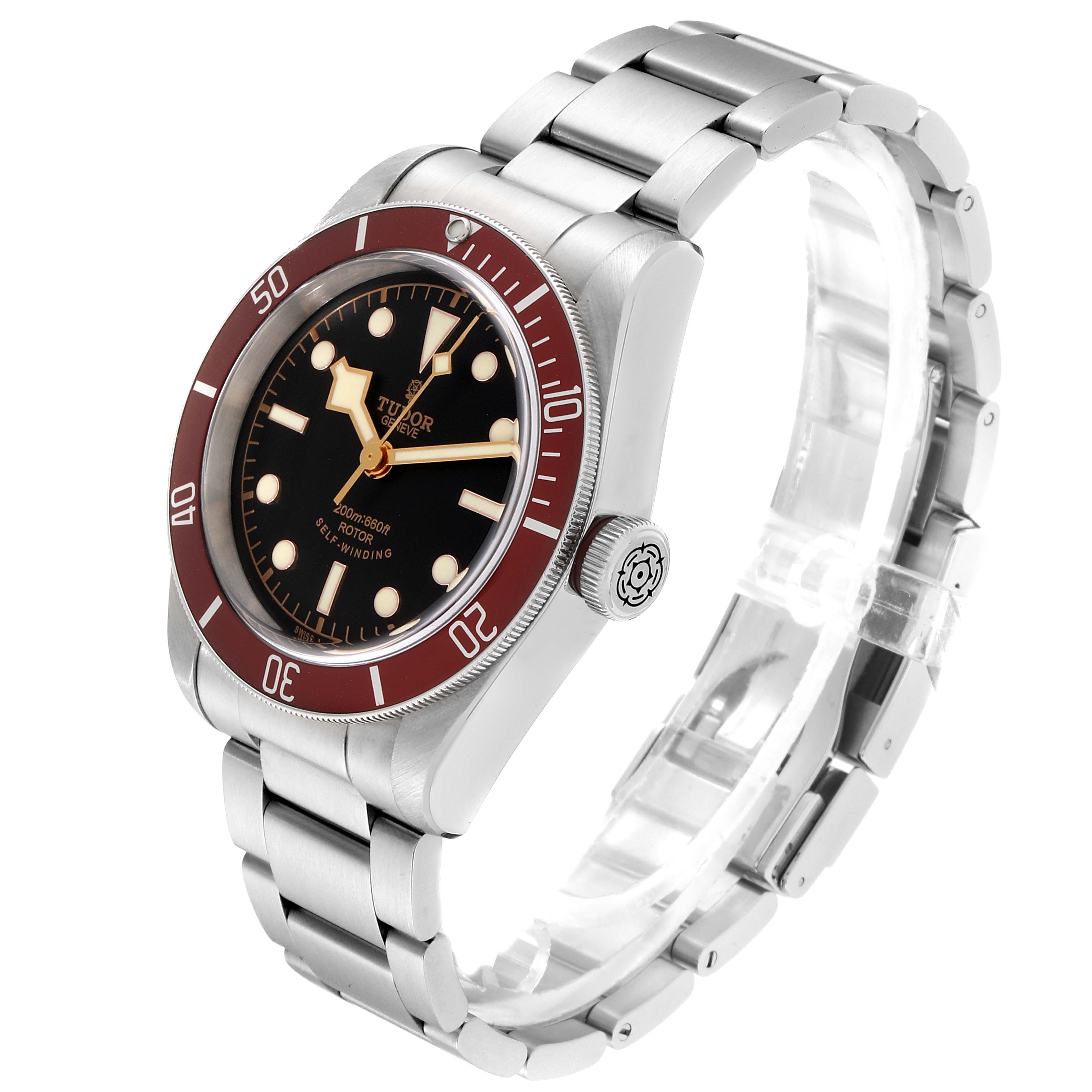 The image shows the Tudor Heritage Black Bay 79220R Men's Stainless Steel Black Dial 79220R Men's Stainless Steel Black Dial watch from a front-left angle, highlighting its dial, bezel, crown, and bracelet.