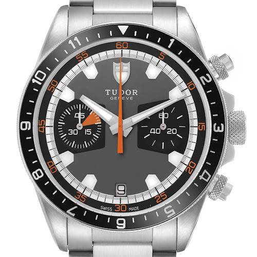 The Tudor Heritage Chrono 70330N-65740 Men's Stainless Steel Grey Dial watch is shown from a front angle, displaying the dial, bezel, and side pushers.