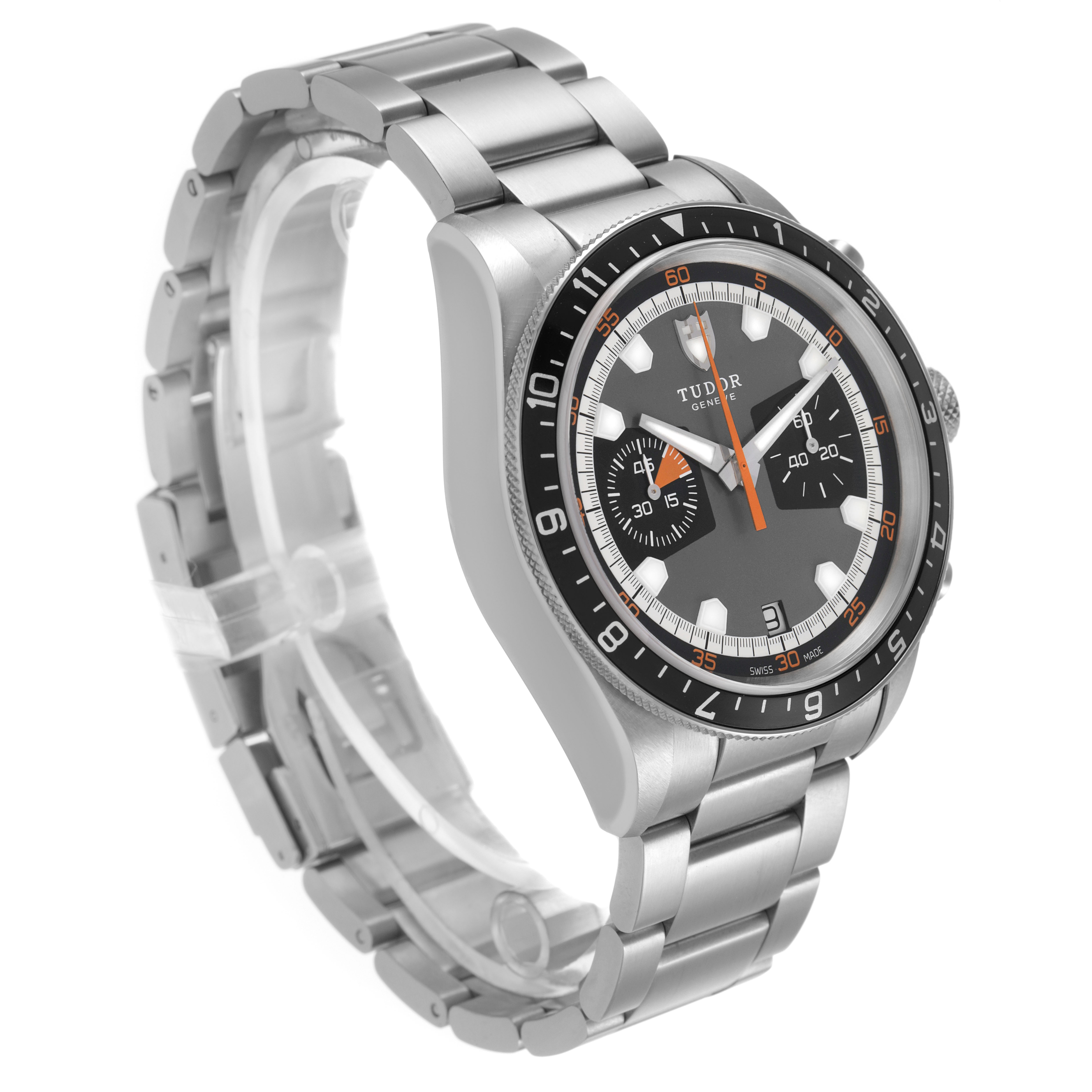 The Tudor Heritage Chrono 70330N-65740 Men's Stainless Steel Grey Dial watch is shown at a three-quarter angle, highlighting the face, bezel, and bracelet.