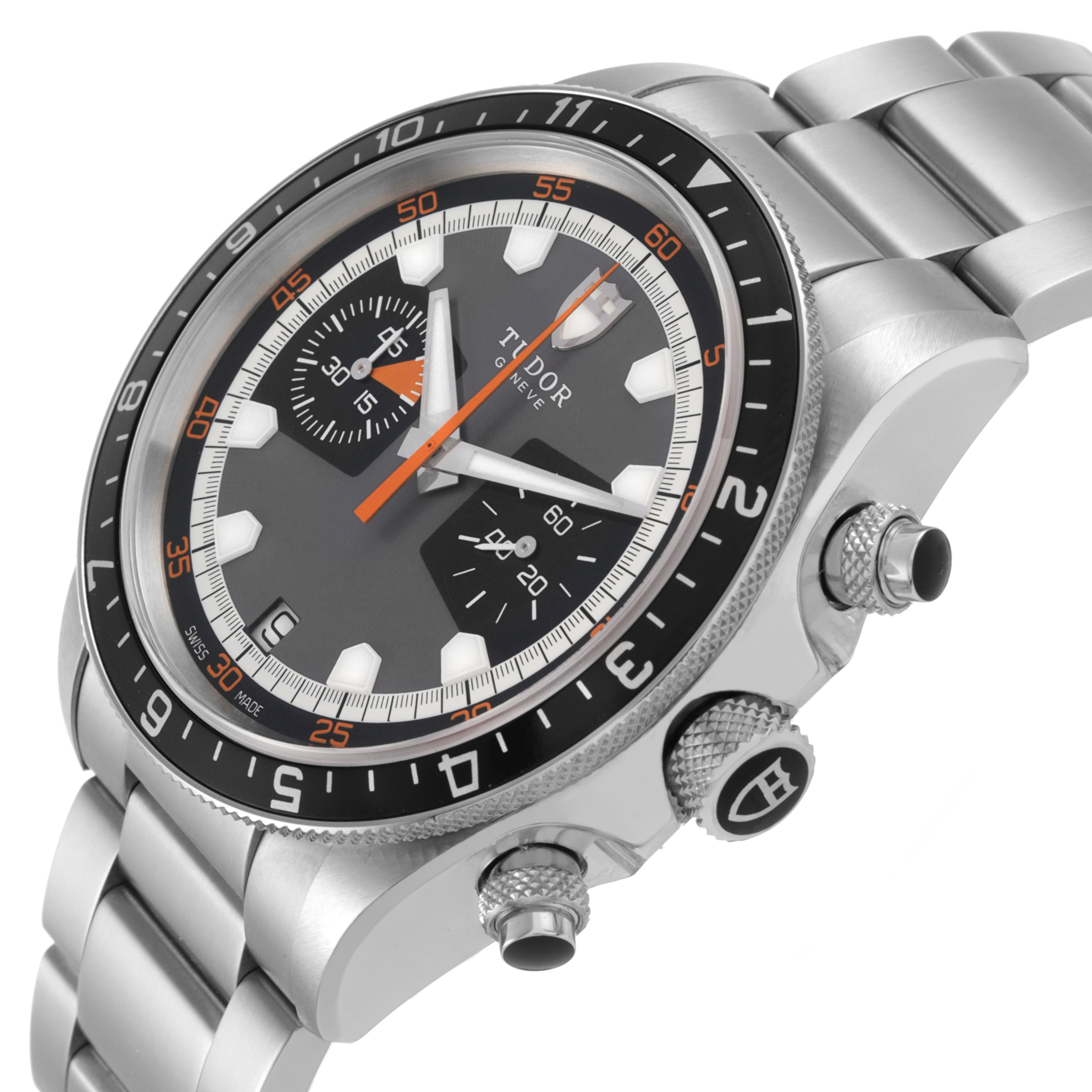 The Tudor Heritage Chrono 70330N-65740 Men's Stainless Steel Grey Dial watch is shown from an angled side view, highlighting the bezel, dial, crown, and pushers.