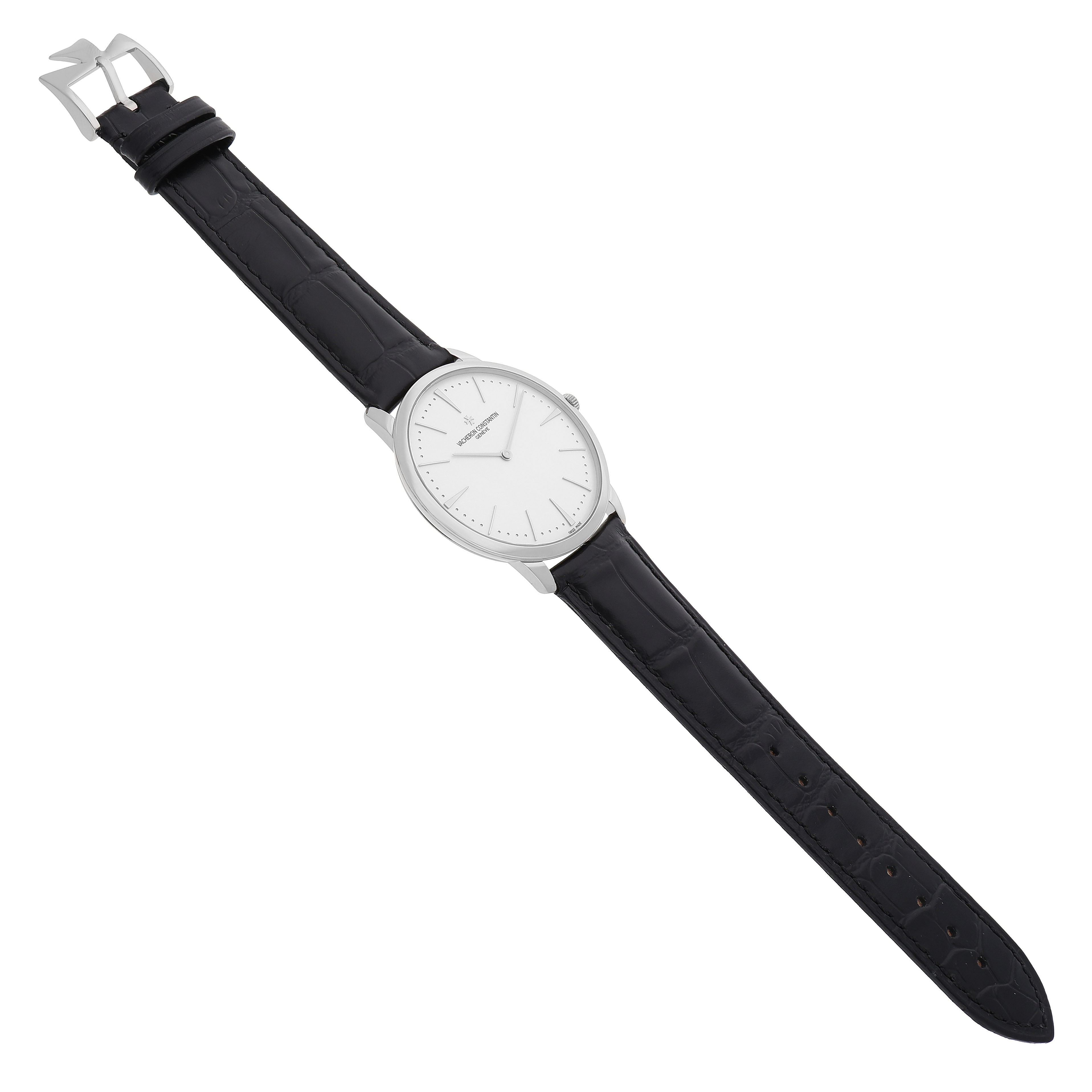 The Vacheron Constantin Patrimony 81180/000G-9117 Men's White Gold Silver Dial watch is shown at an angled top view, highlighting its dial, case, and leather strap with a buckle.